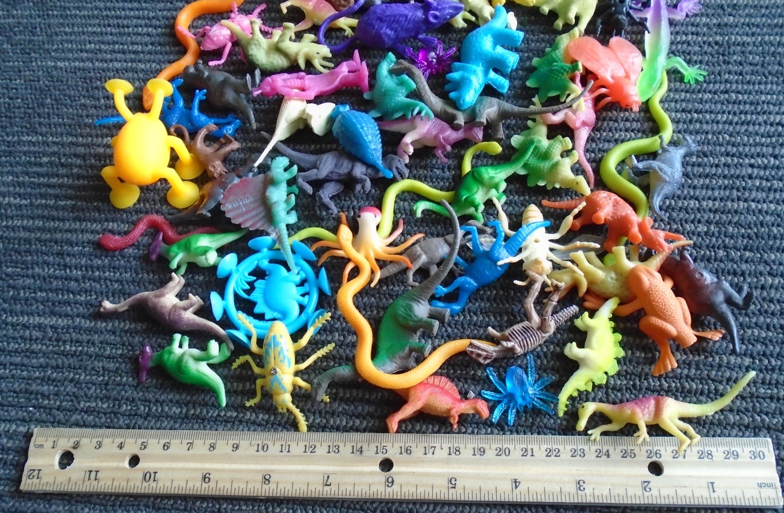 Huge mixed toy lot of Dinosaurs, Bugs, Spiders, Snakes, Reptiles and more!