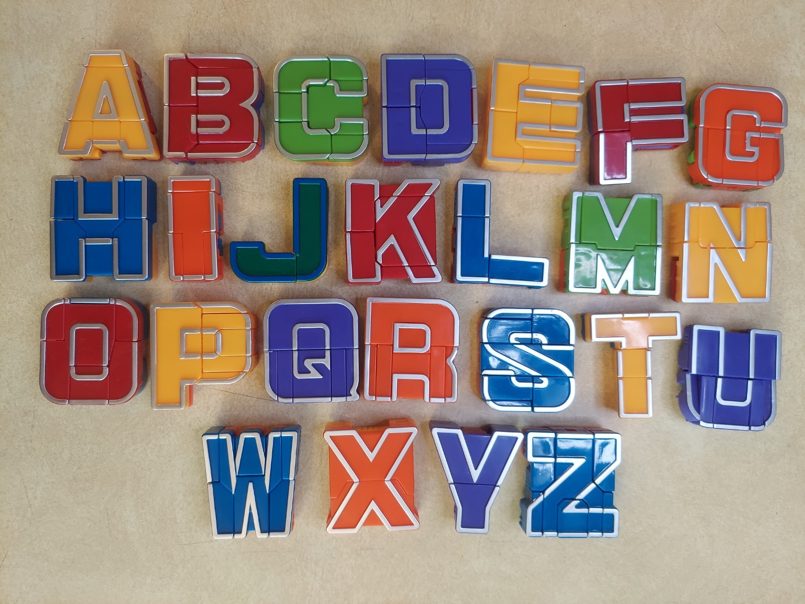 Alpha Bots Transforming Robot Transformers 25 Letter Set MISSING V