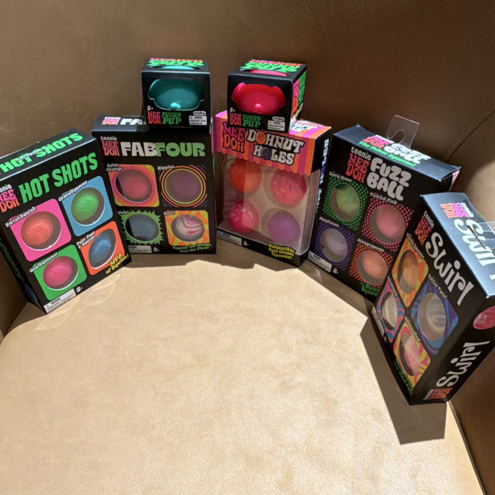 Nee Doh Lot of 7 Hot Shots Swirl Fuzz Ball Fab Four Funky Pup Donut Holes
