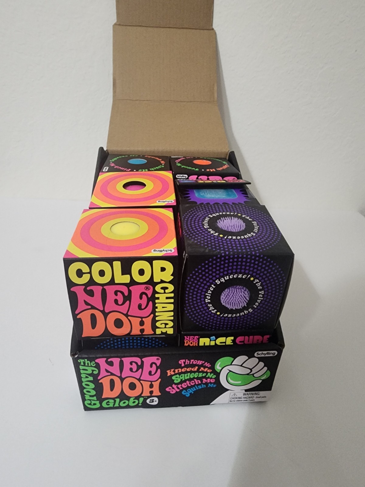 NeeDoh x12 Variety Selection With A NeeDoh Groovy Glob Box