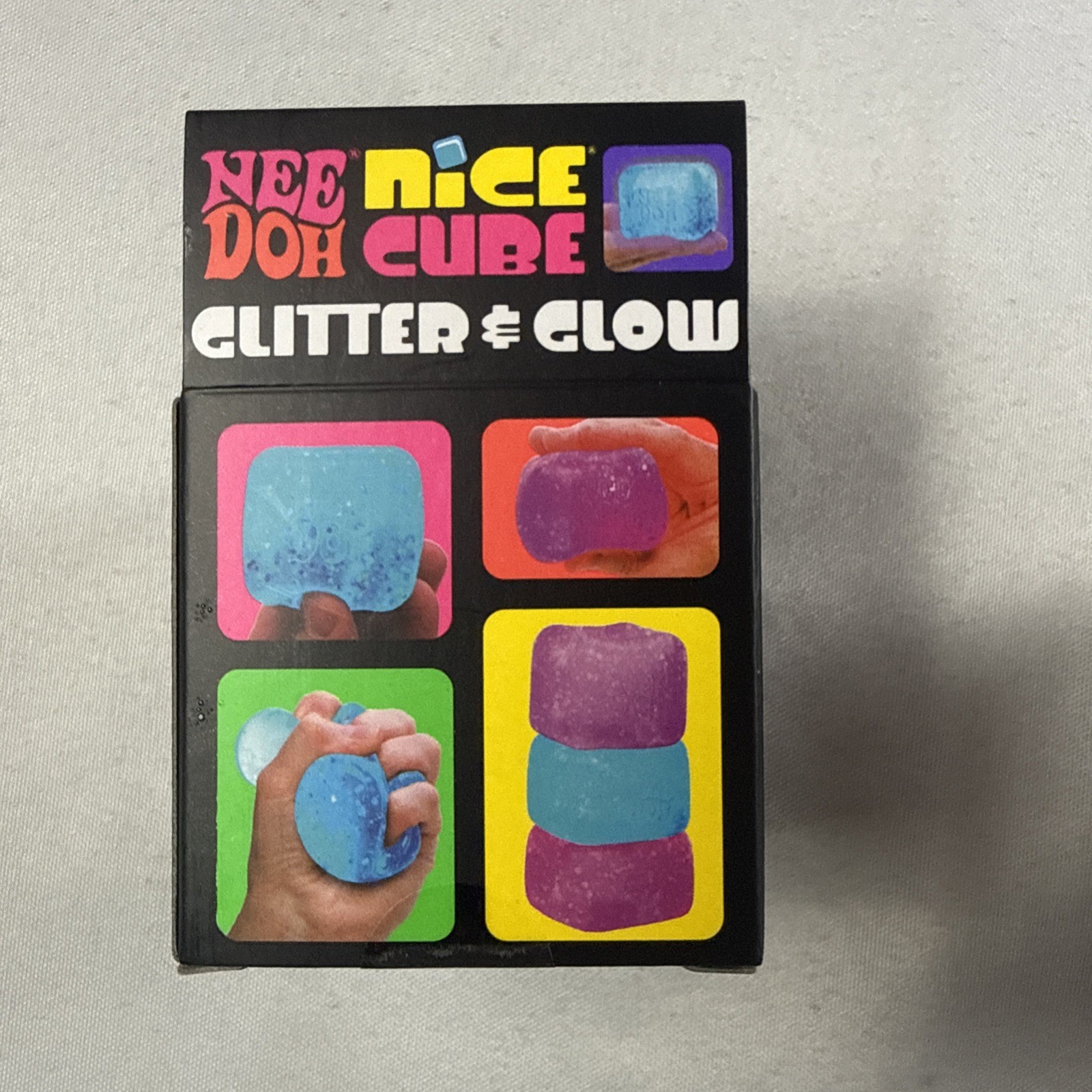 NeeDoh Nice Cube Glitter and Glow, Squishy, Glowing Ice Cube Pink And Blue