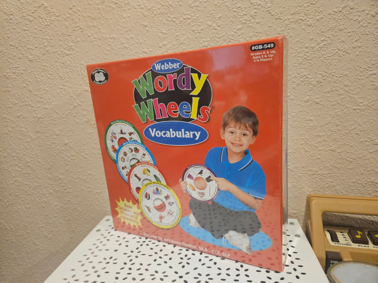 | Webber® Wordy Wheels® VOCABULARY GRADES K AND UP – 2-6 PLAYERS SUPER DUPER