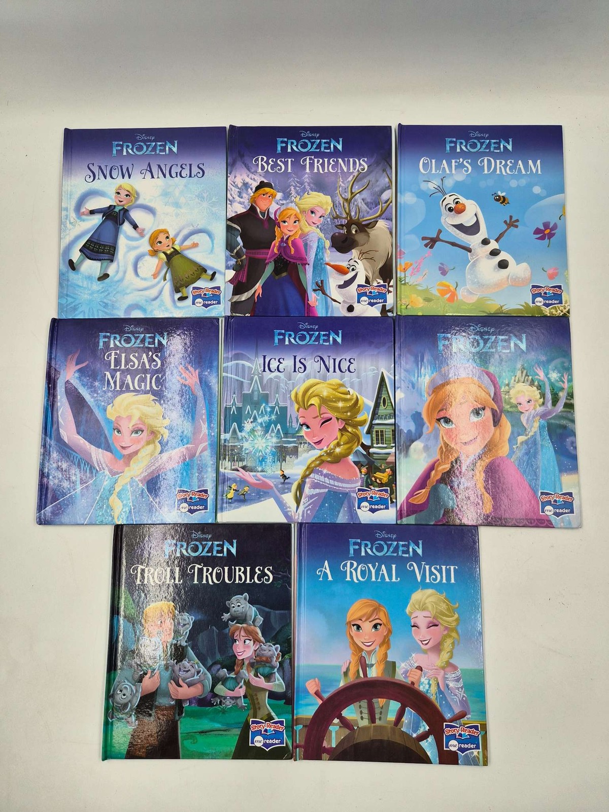 Disney Frozen Me Reader 8-Book Interactive Reading System with Electronic Pad