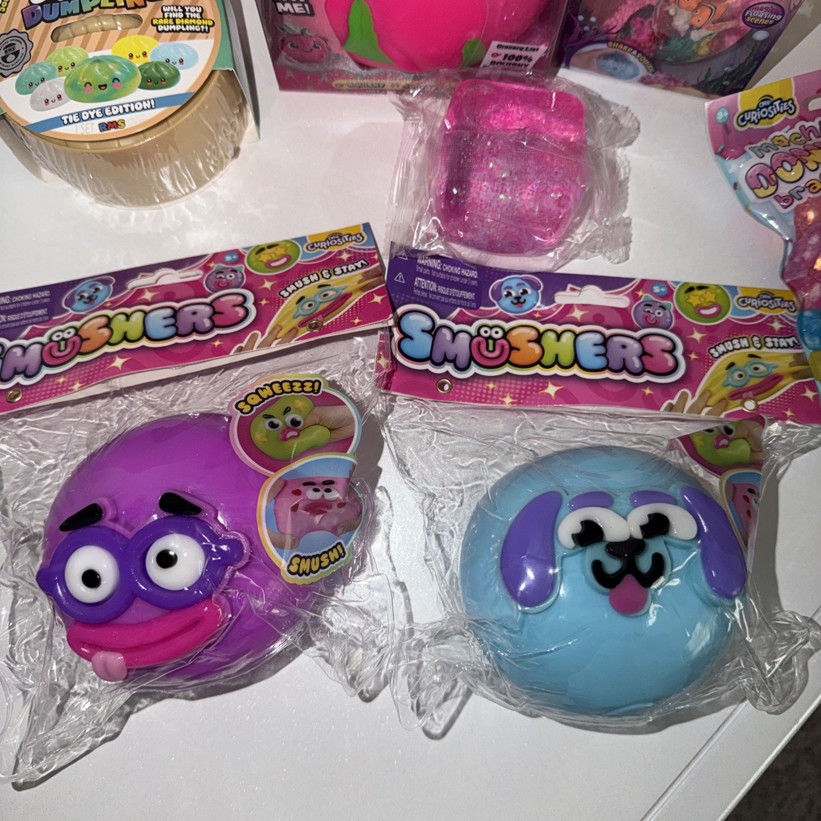 (7 Piece Bundle) Smushers Smushmart Dragonfruit rms Dumpling Orb Squish Ball