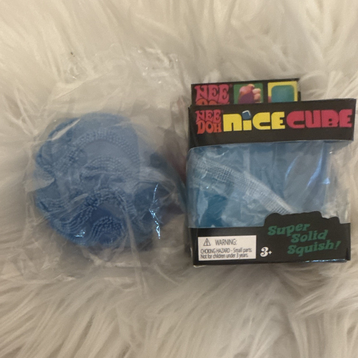 Schylling Nee Doh Nice Cube Squish toy. *Comes with another squishy. ￼