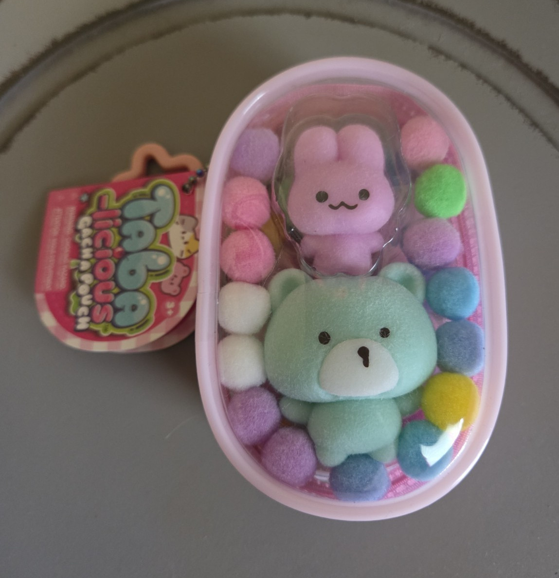 Taba-licious Gacha Pouch Pink Pom Poms Multicolor