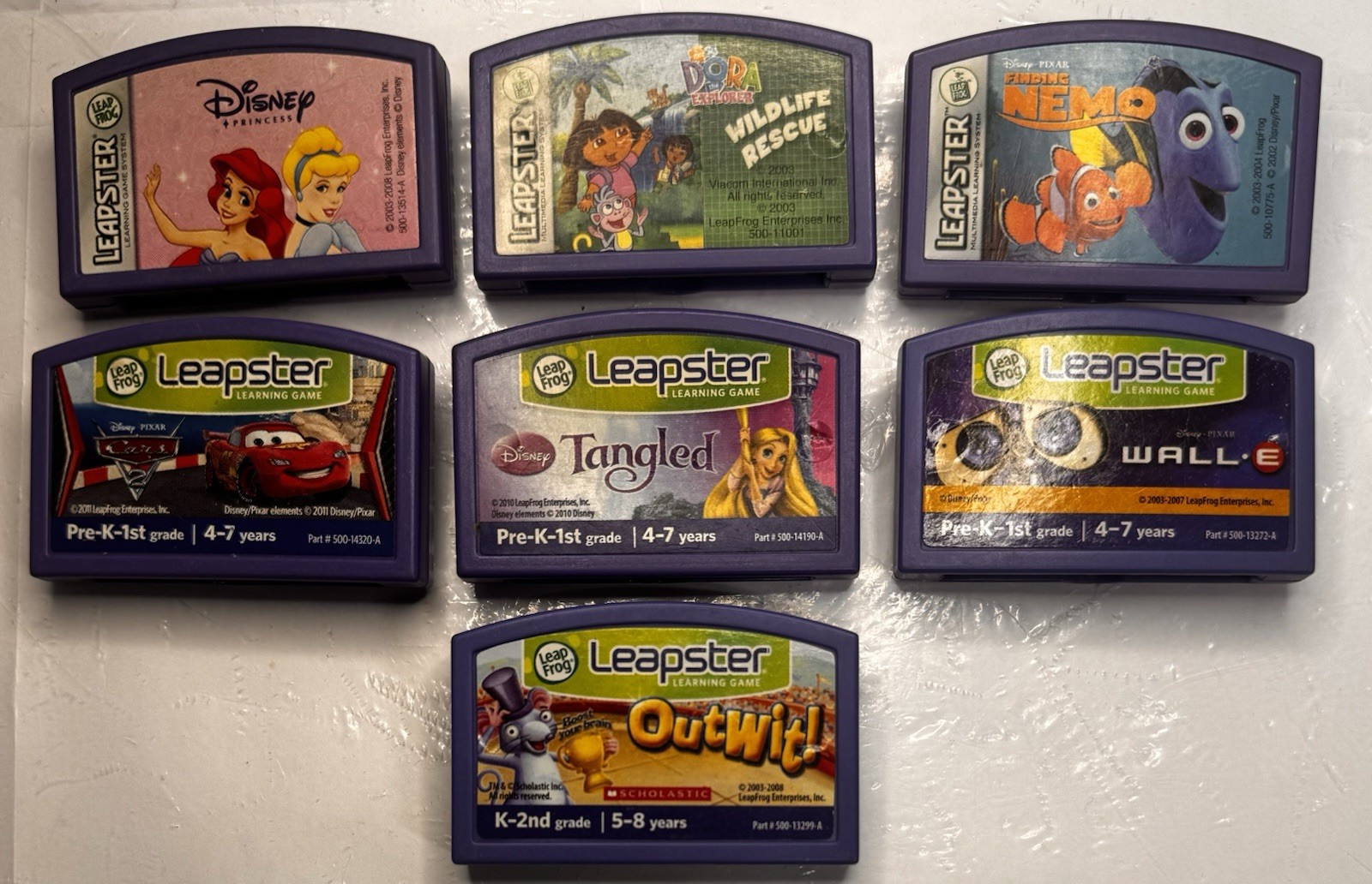 LeapFrog LEAPSTER LEARNING GAME LOT – 7 Cartridges – Dora Finding Nemo Tangled