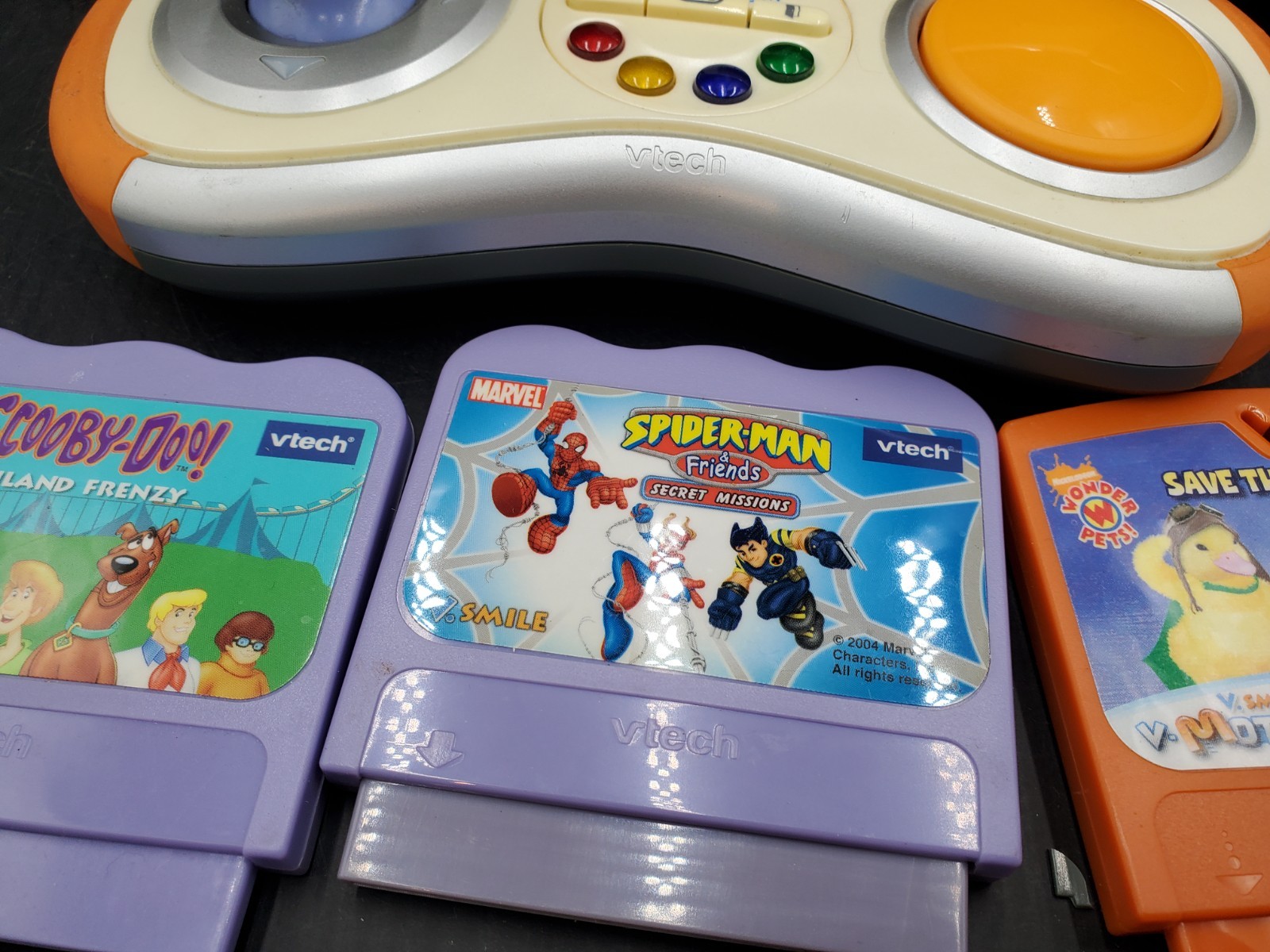 Vtech V.Smile V-Motion Active Learning Gray Console w/5 Cartridge game powers up