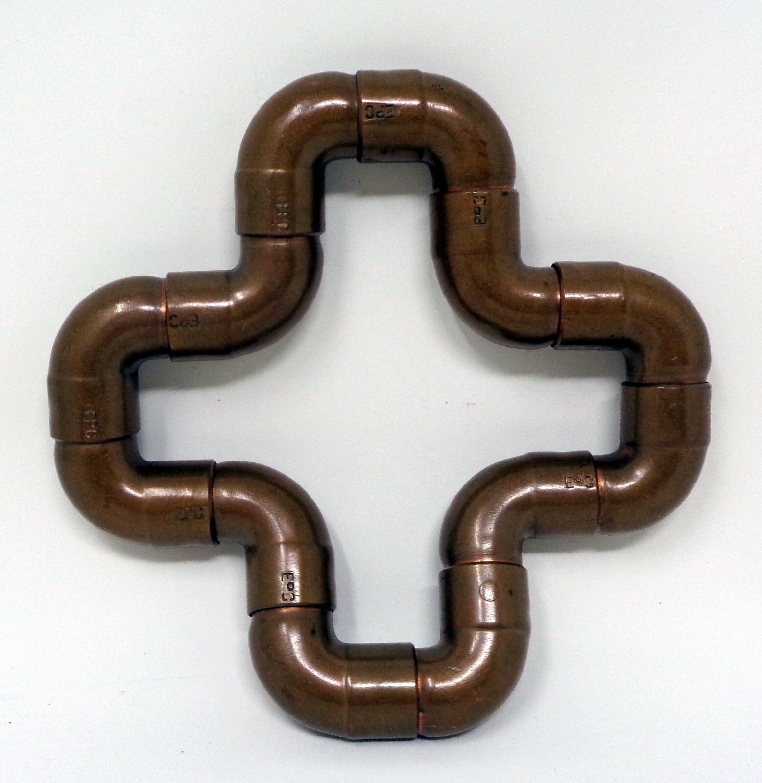 Metallic Bronze Twist In Many Shapes Toy