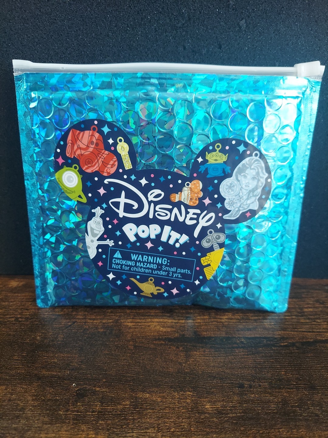 Disney Pop It! Mystery Bag Aladdin’s Lamp Mini Sensory Toy, Card, & Stickers