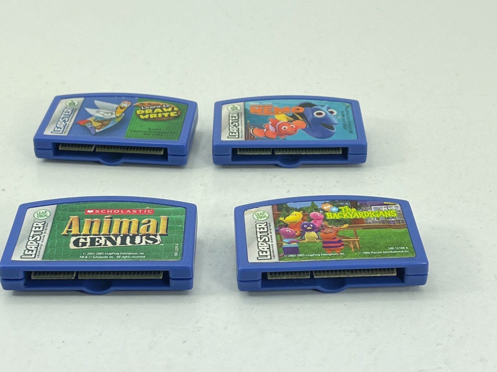 Leapster LeapFrog Finding Nemo Draw Write Animal Genius Backyardigans 4 Game Lot