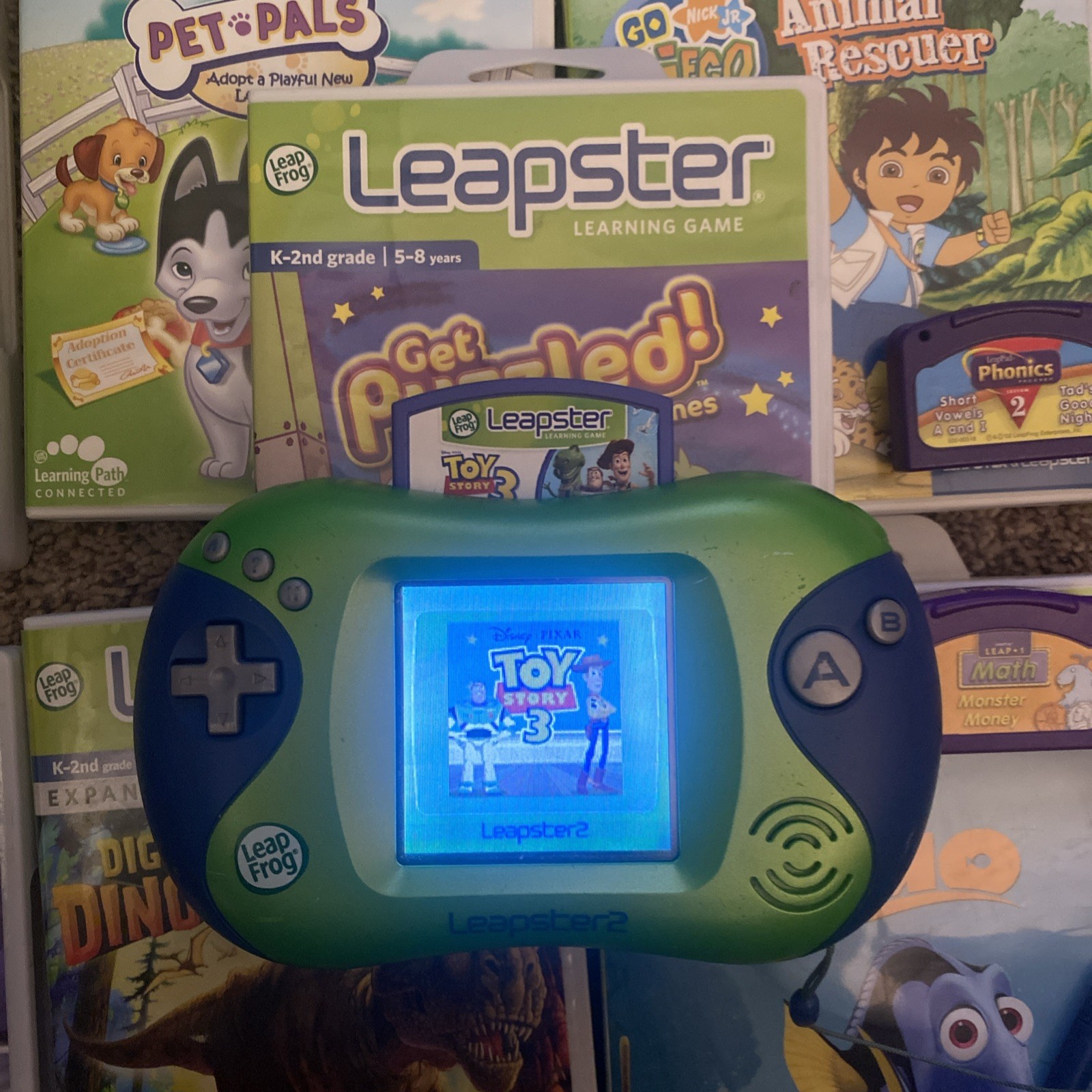Leap Frog Leapster 2 Handheld Game, With 9 Games, Pre-Owned No Power Cord Works