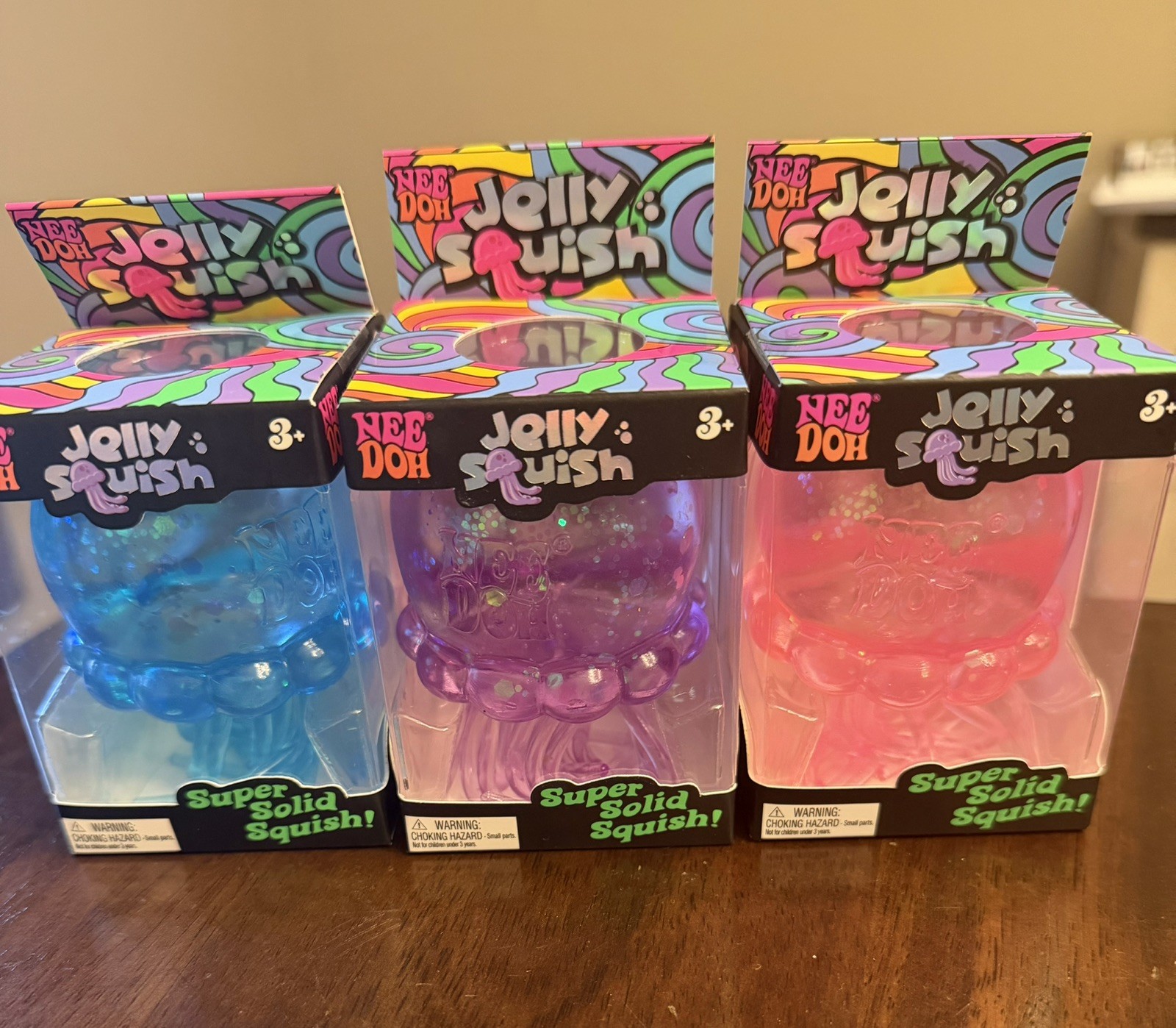 NeeDoh Nee Doh Jelly Squish Super Authentic Jelly Fish Lot Of 3 Pink Blue Purple