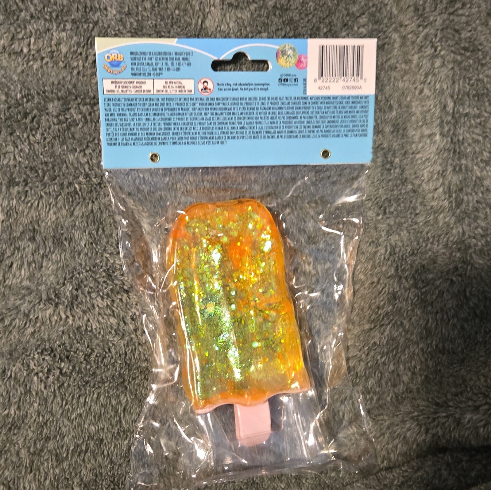 ORB Sugar Swaps Ice Pop Squeeze Squish & Stretch Toy, Orange Gold Glitter