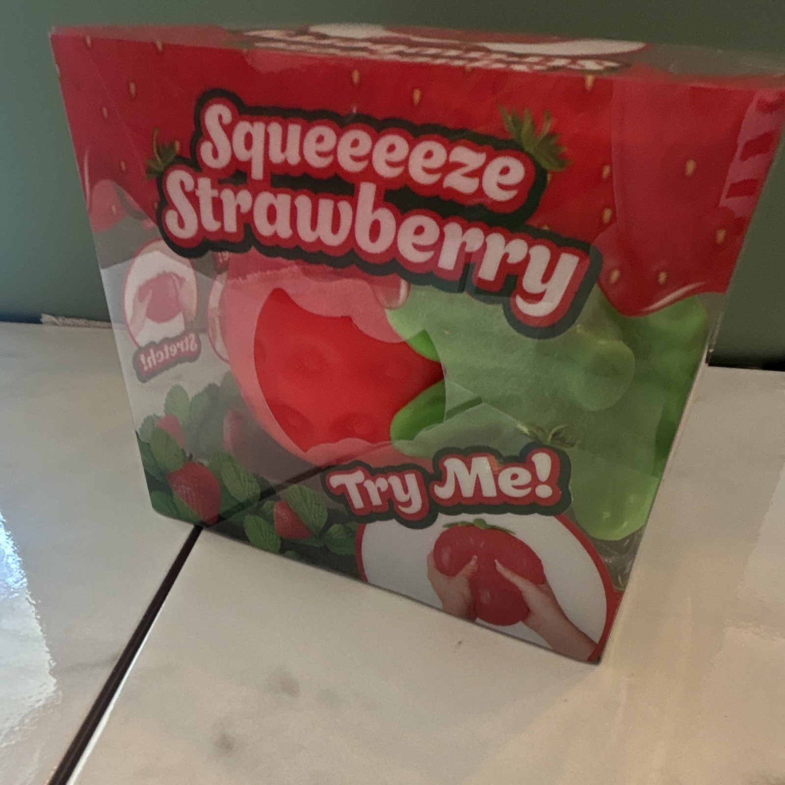 Sunny Days Squeeeeze Strawberry Gel Tactile Squeeze Toy Red/Green Squishy