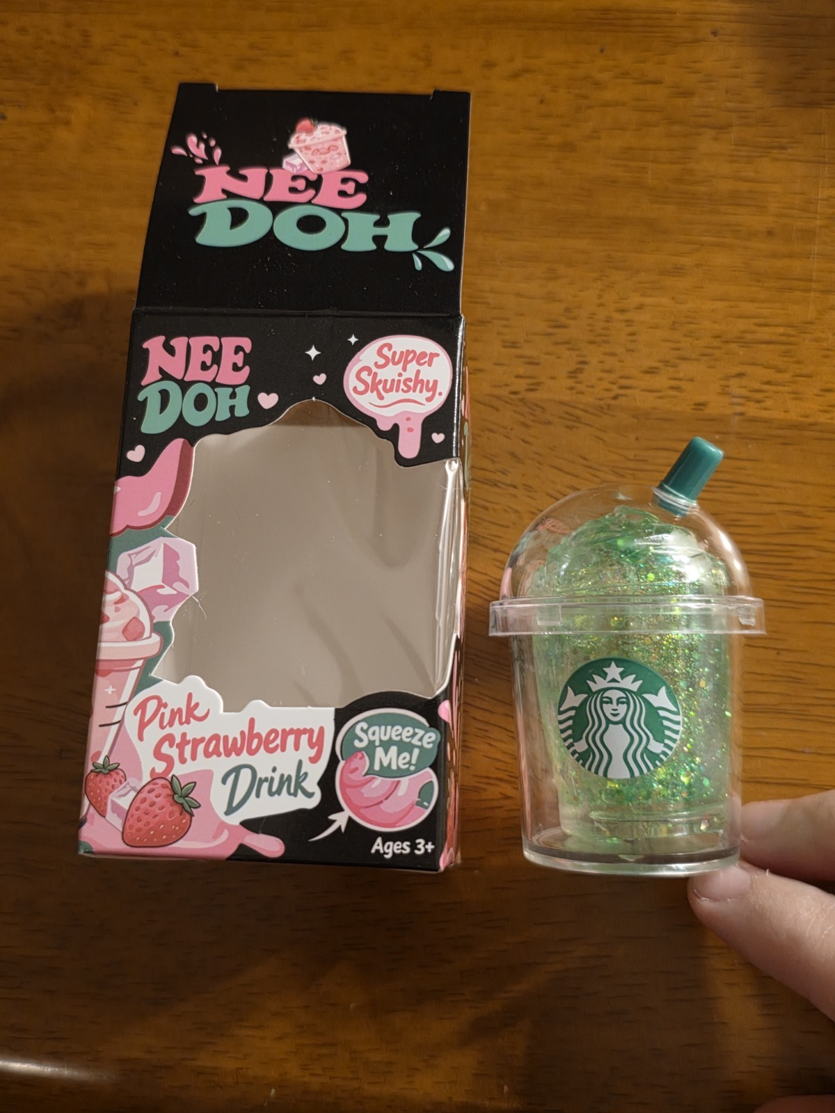 Small green Starbucks Strawberry Pink sugar filled squishy toy, new in box