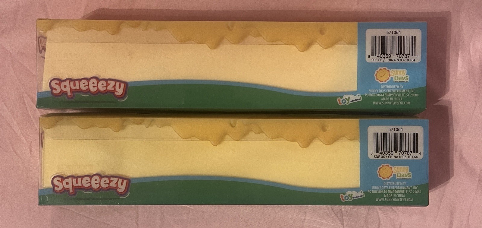 2 Viral Sunny Days Squeezy Butter Sticks.
