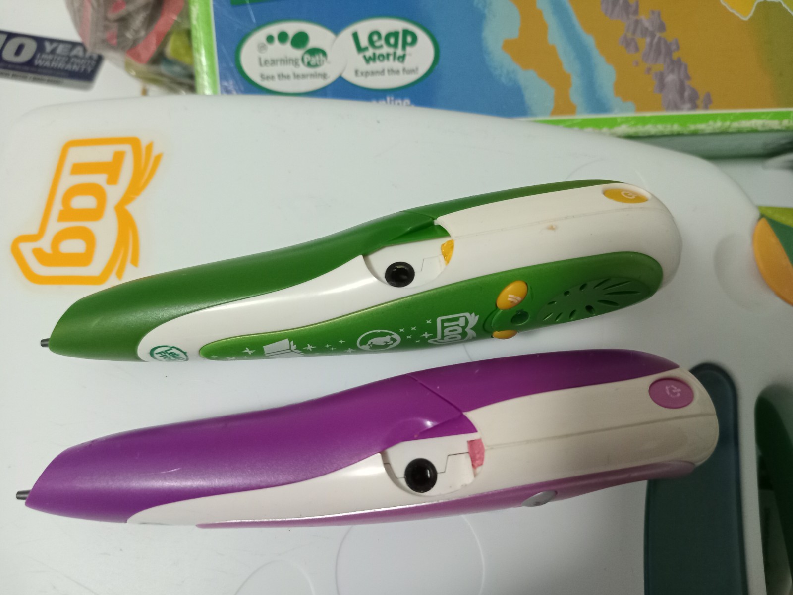 LeapFrog Tag Reading System Bundle- 2 Pens-Case- 4 Books – Map-cables-car Charge