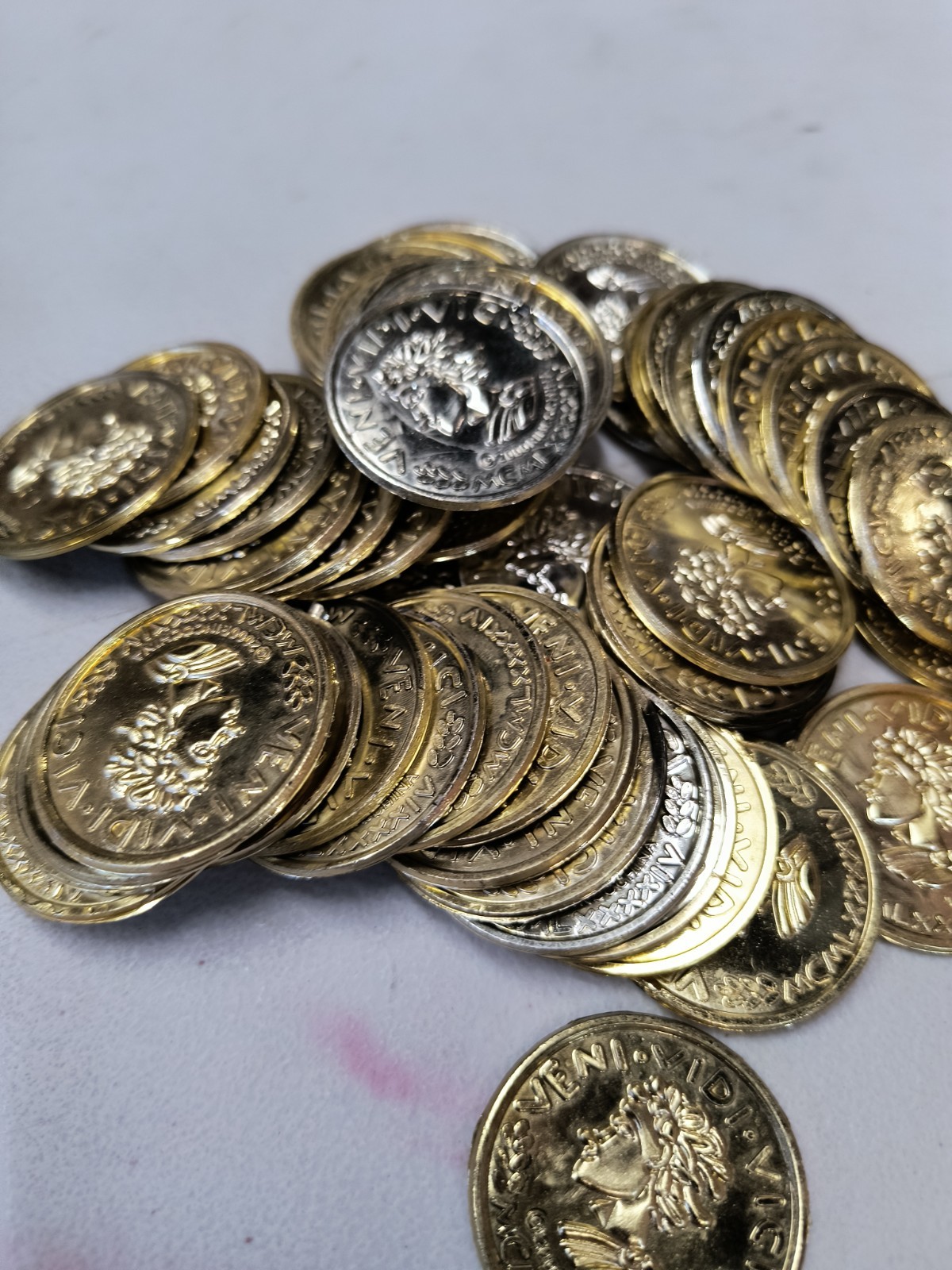 Plastic Gold Colored Toy Coins Lot of approximately – VENI VIDI VICI 2000 yr