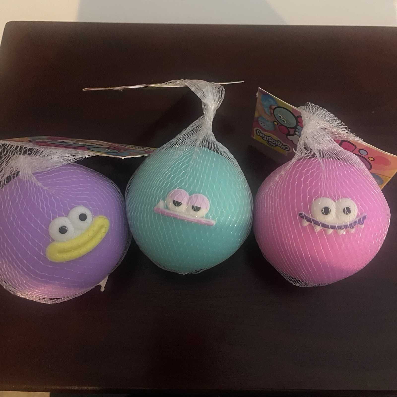 Orb Curiosities Funny Face Ball Squishy Toys Pink,Purple,Teal Set Of 3