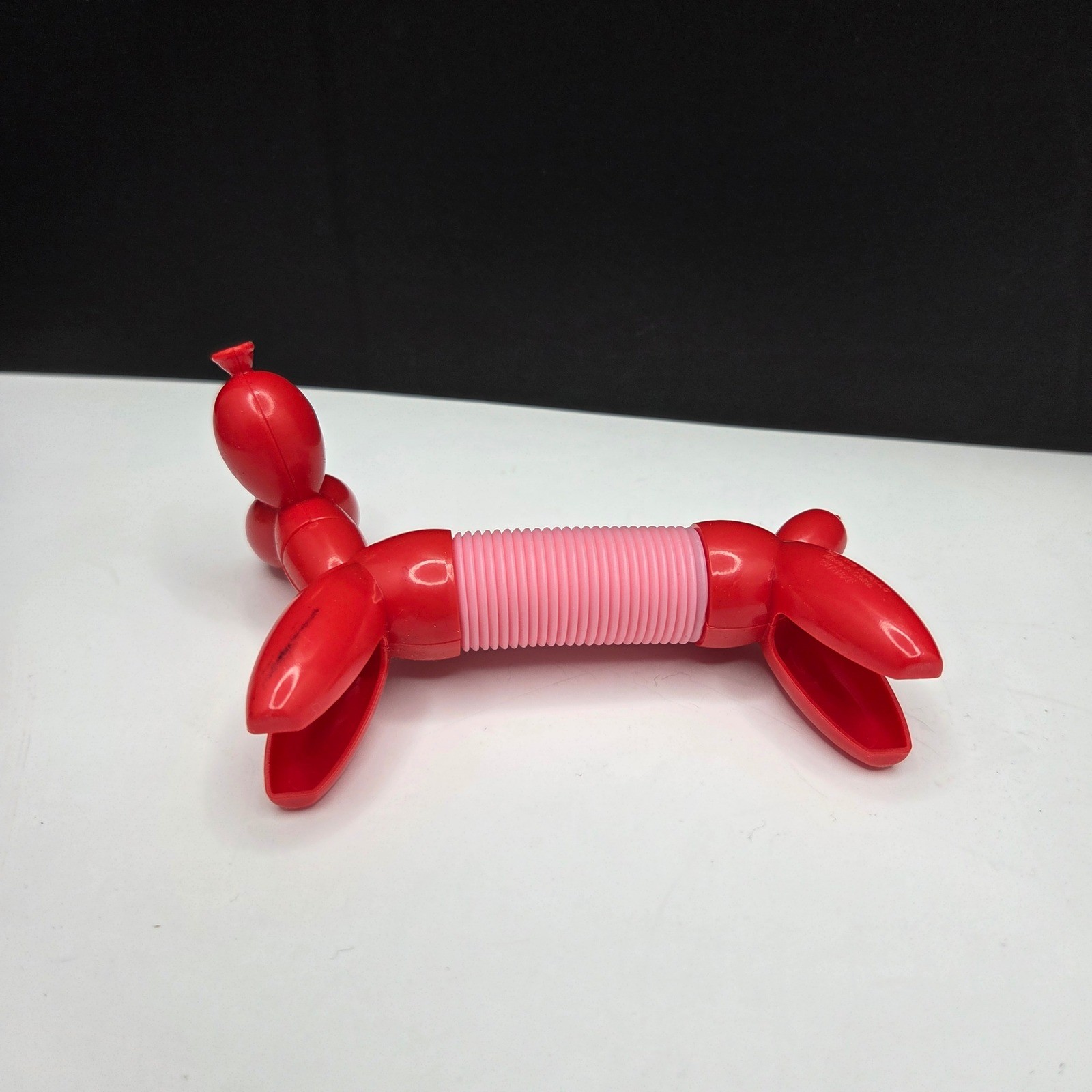 Zuru Tangle Pets Balloon Dog Fidget Toy Red Pink Expandable Sensory Toy 4-8in