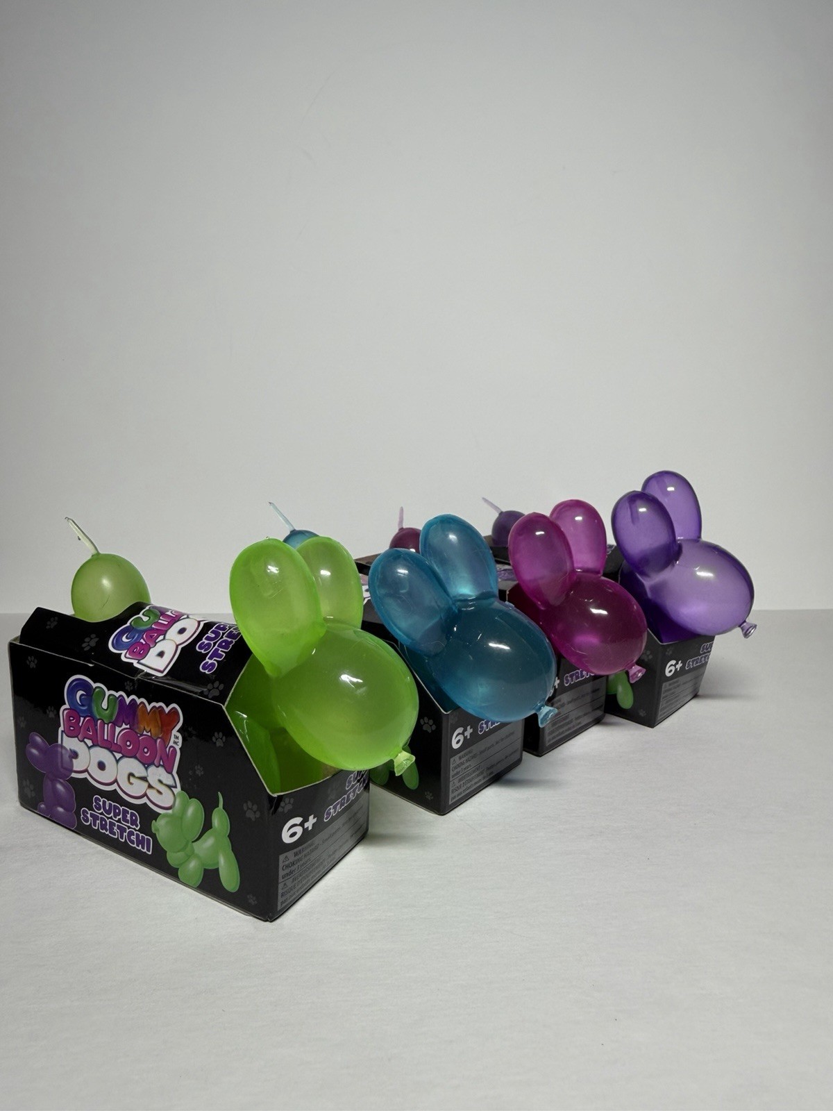 Gummy Balloon Dogs Super Stretchy Toy Blue Pink Purple And Green Set Lot Of 4