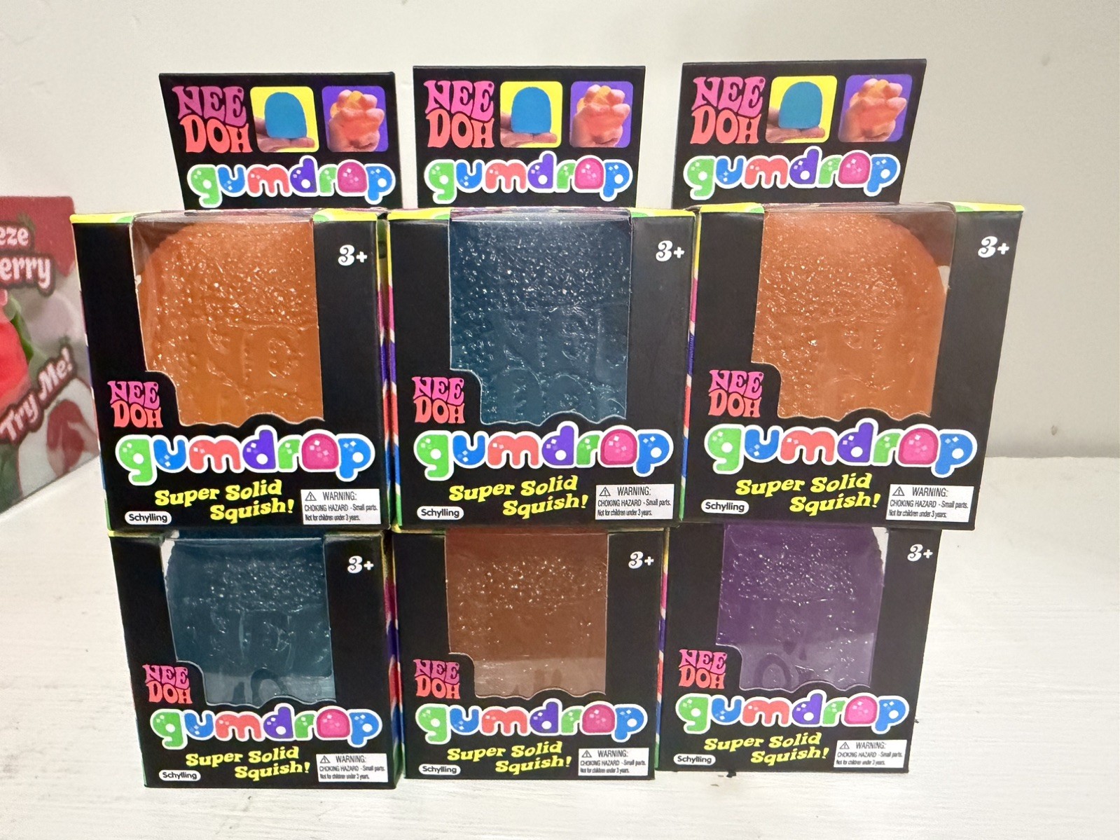 Nee Doh Nice Cube Super Solid Gum Drop Set of 6- 3 Orange 2 Blue and 1 purple