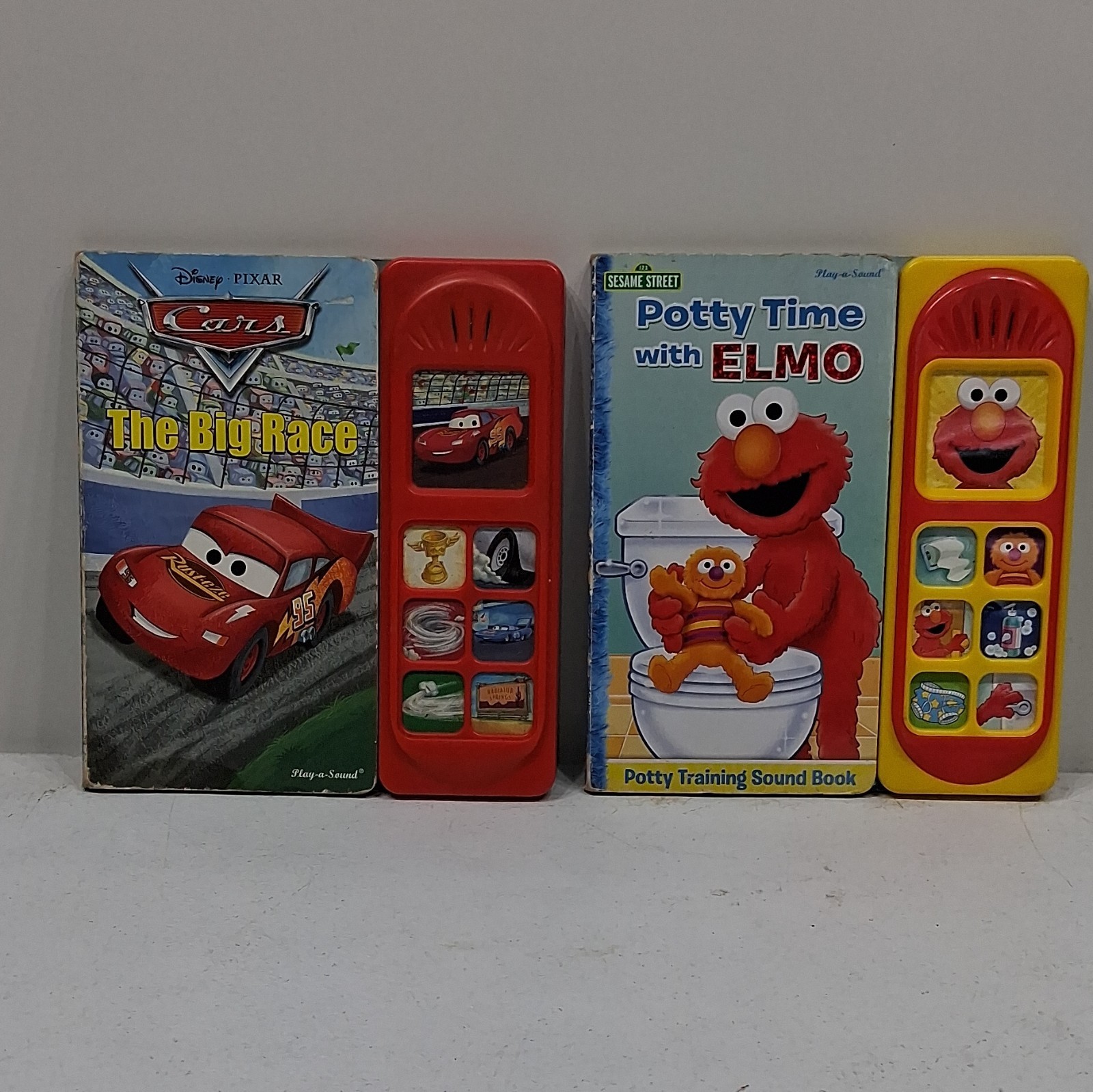 Play a sound books Disney Pixar Cars The Big Race; Sesame Street Potty Time Elmo