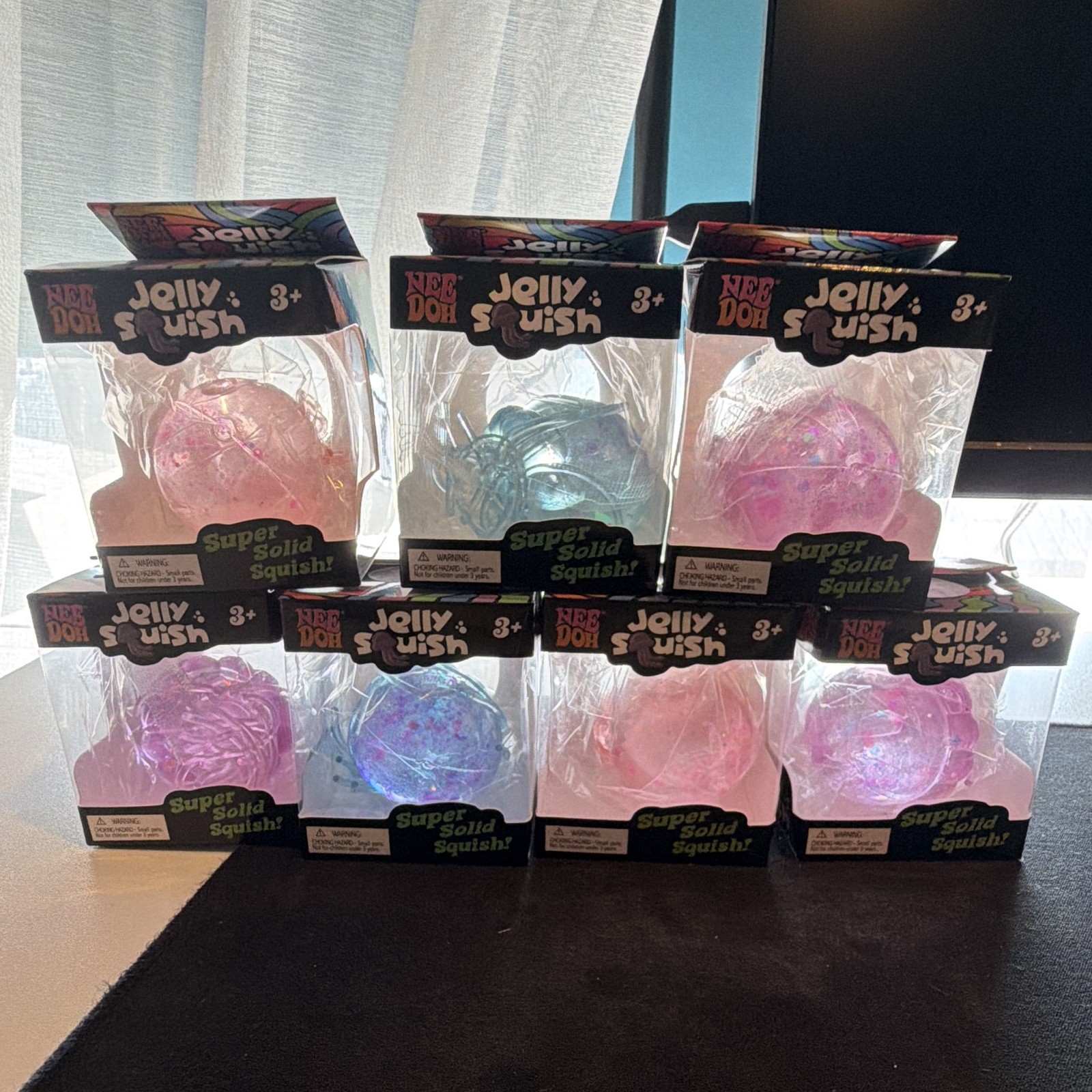 Nee Doh Jelly Squish Super Solid Squeeze Toy Lot of 7, Multicolor, 🪼