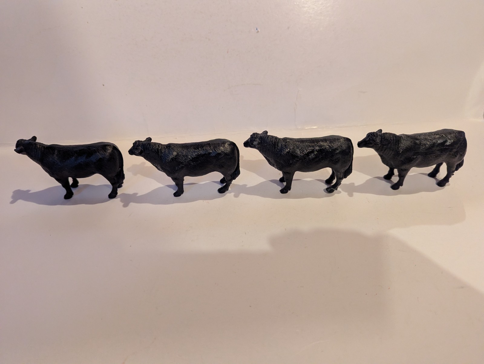 Lot of 4 New Ray Black Angus Cows (3 5/8″)