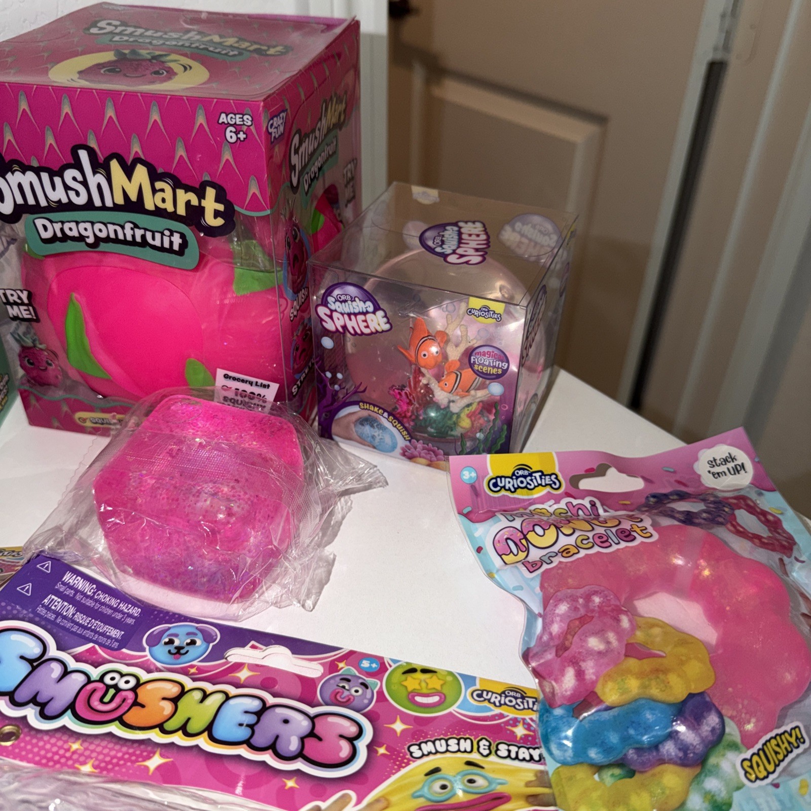 (7 Piece Bundle) Smushers Smushmart Dragonfruit rms Dumpling Orb Squish Ball