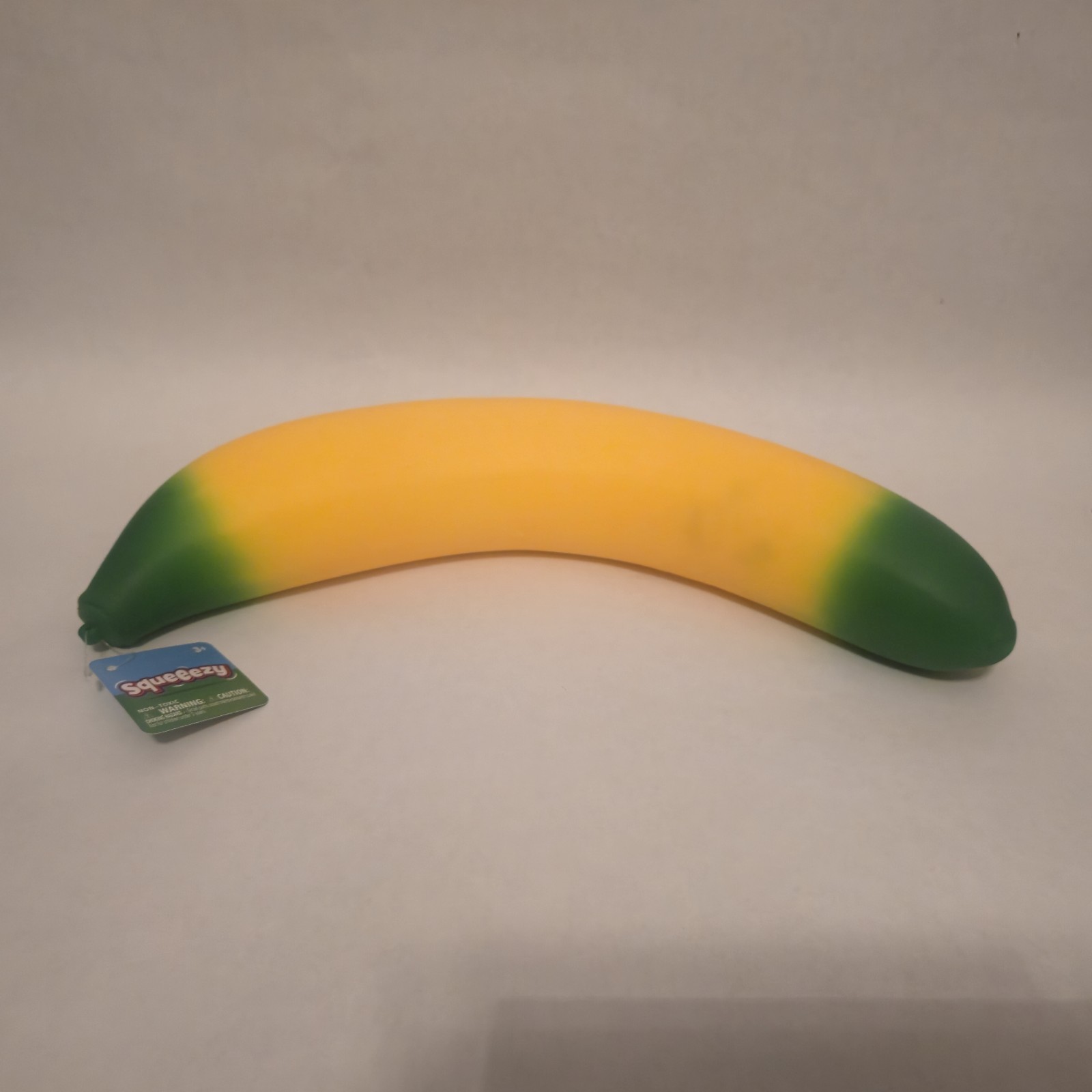Sunny Days Squeezy Squishy Stretchy Banana NEW FAST SHIP