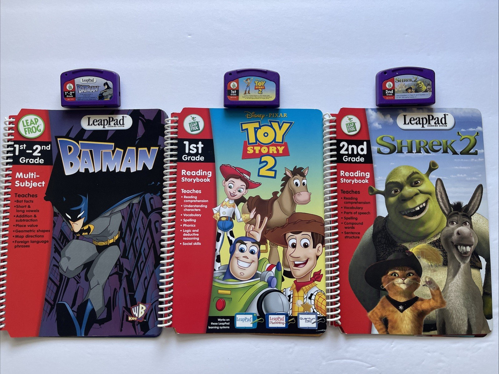 Leap Frog Pad 1st 2nd Grade Shrek 2, Toy Story 2, Batman Books & Cartridges Good