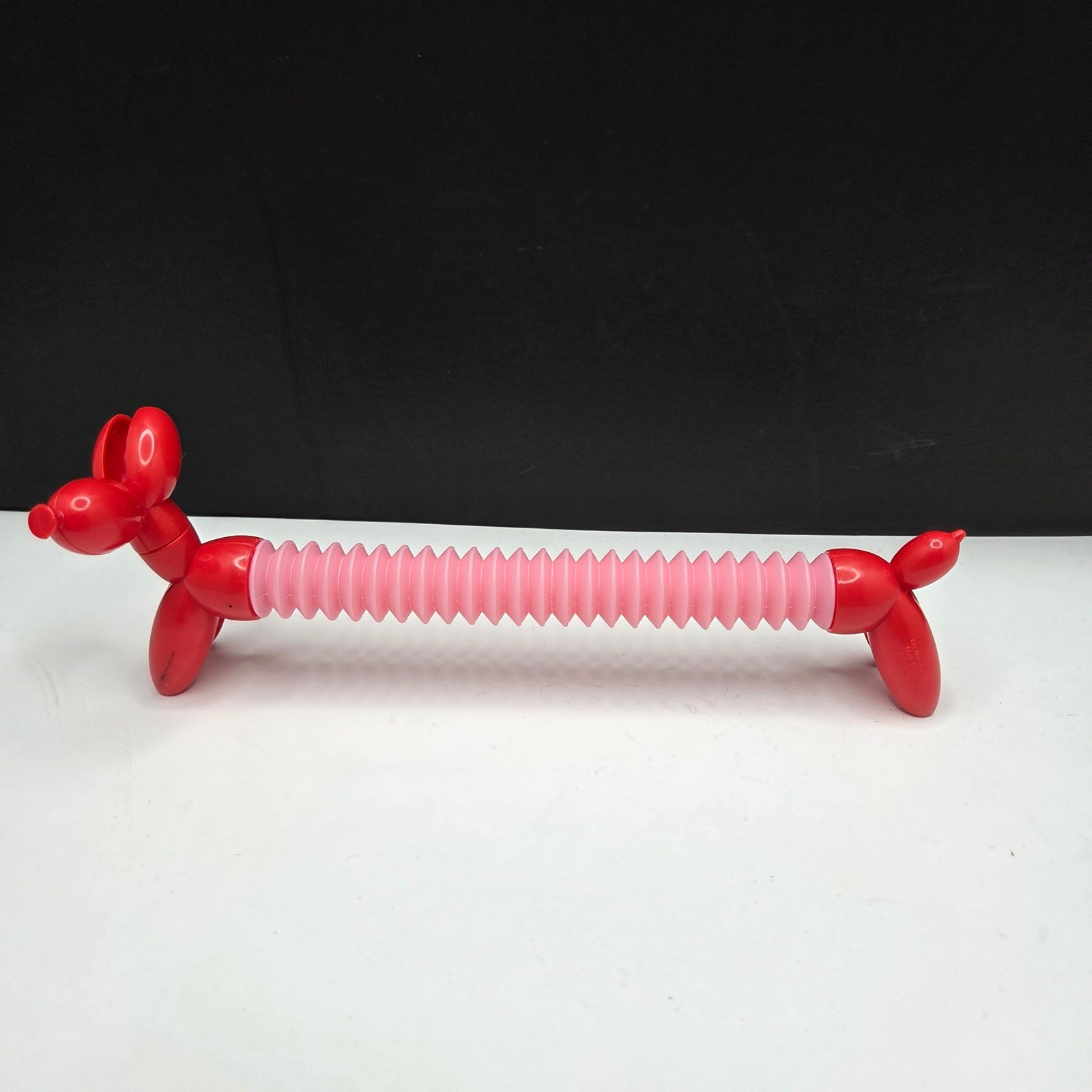Zuru Tangle Pets Balloon Dog Fidget Toy Red Pink Expandable Sensory Toy 4-8in