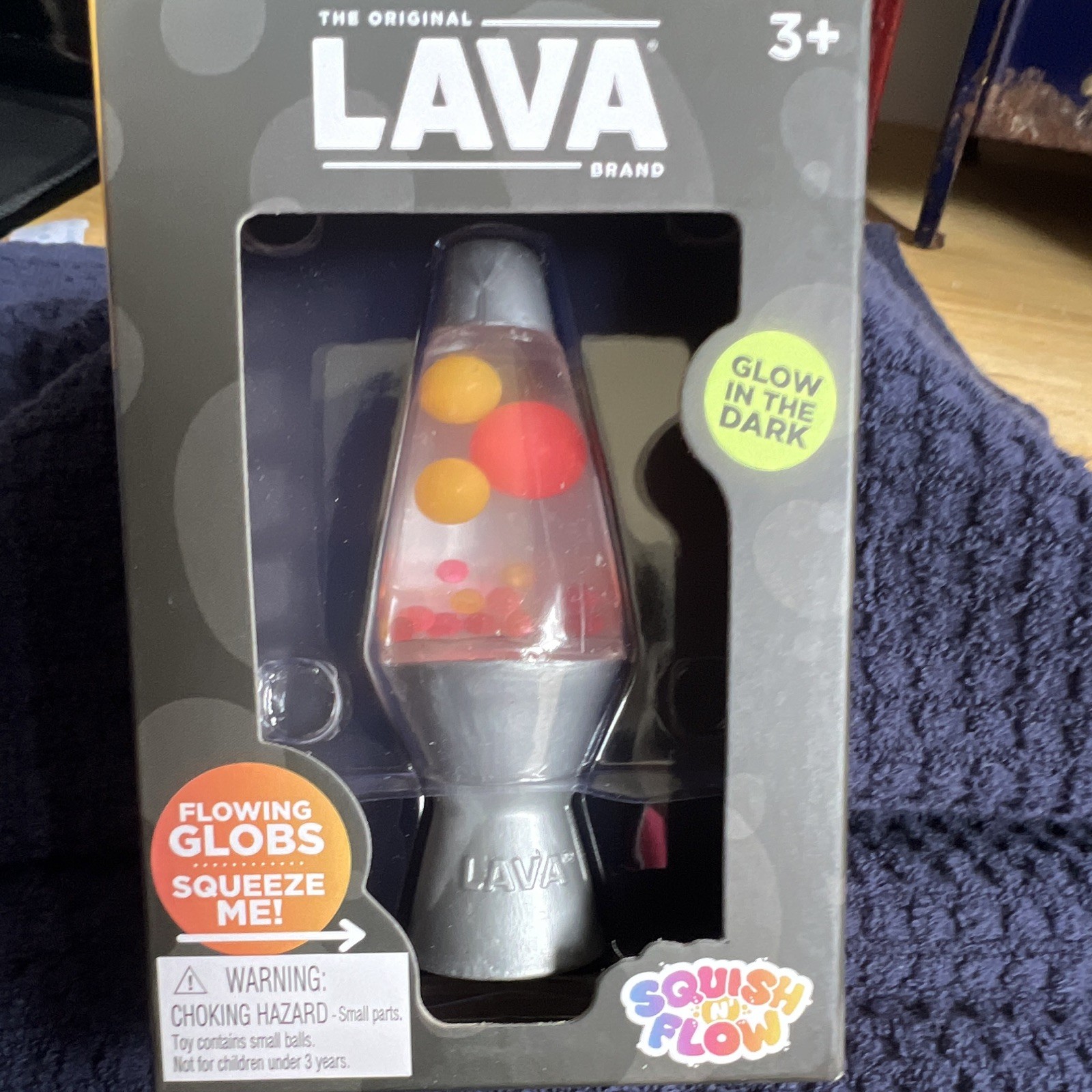 LAVA Squish ‘n’ Flow Glow in the Dark Squeeze Toy Silver/Red/Orange 2024