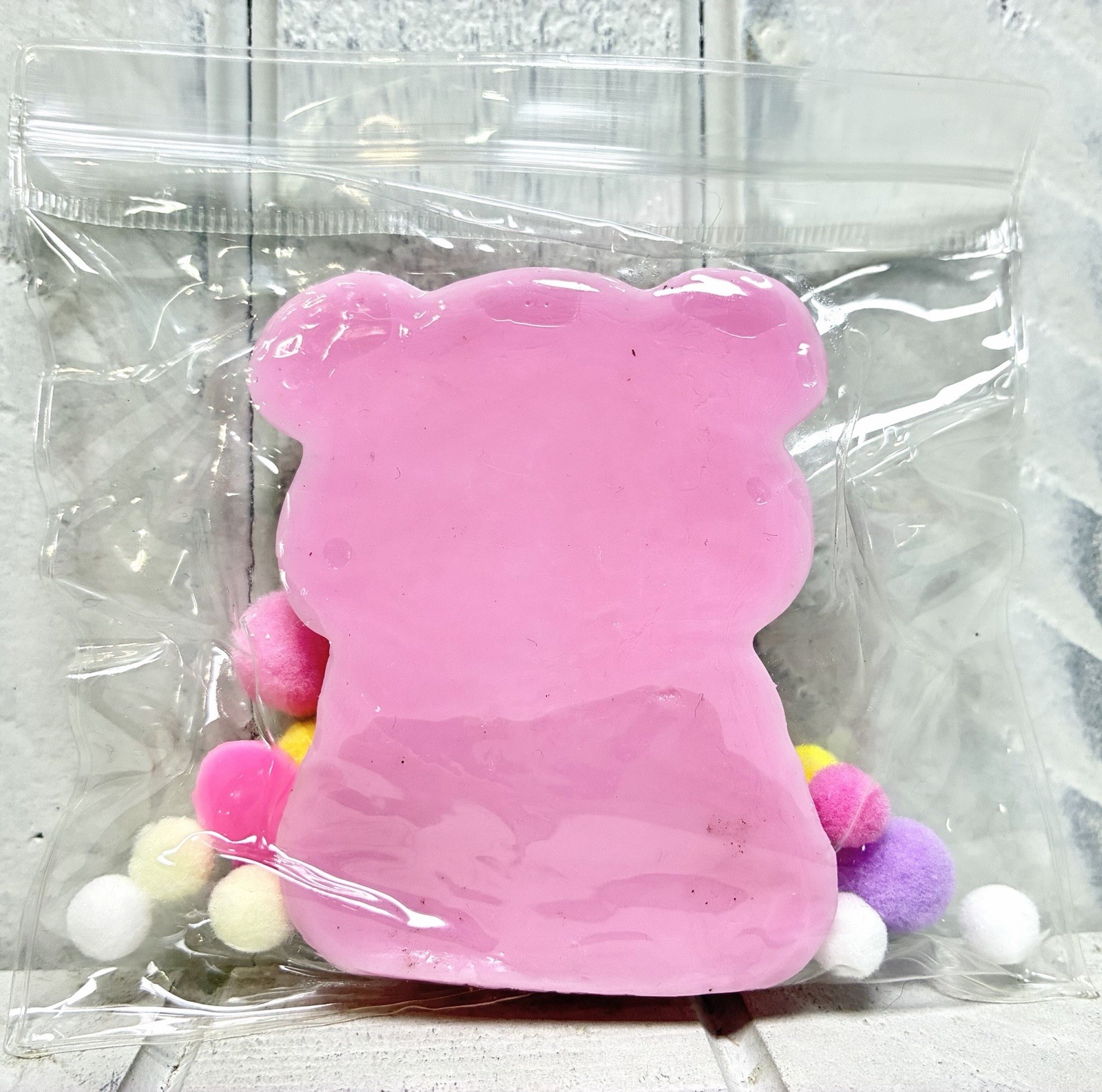 Squishy Toy Cute Pink Teddy Bear With Colorful Pom Poms In Clear Resealable Bag