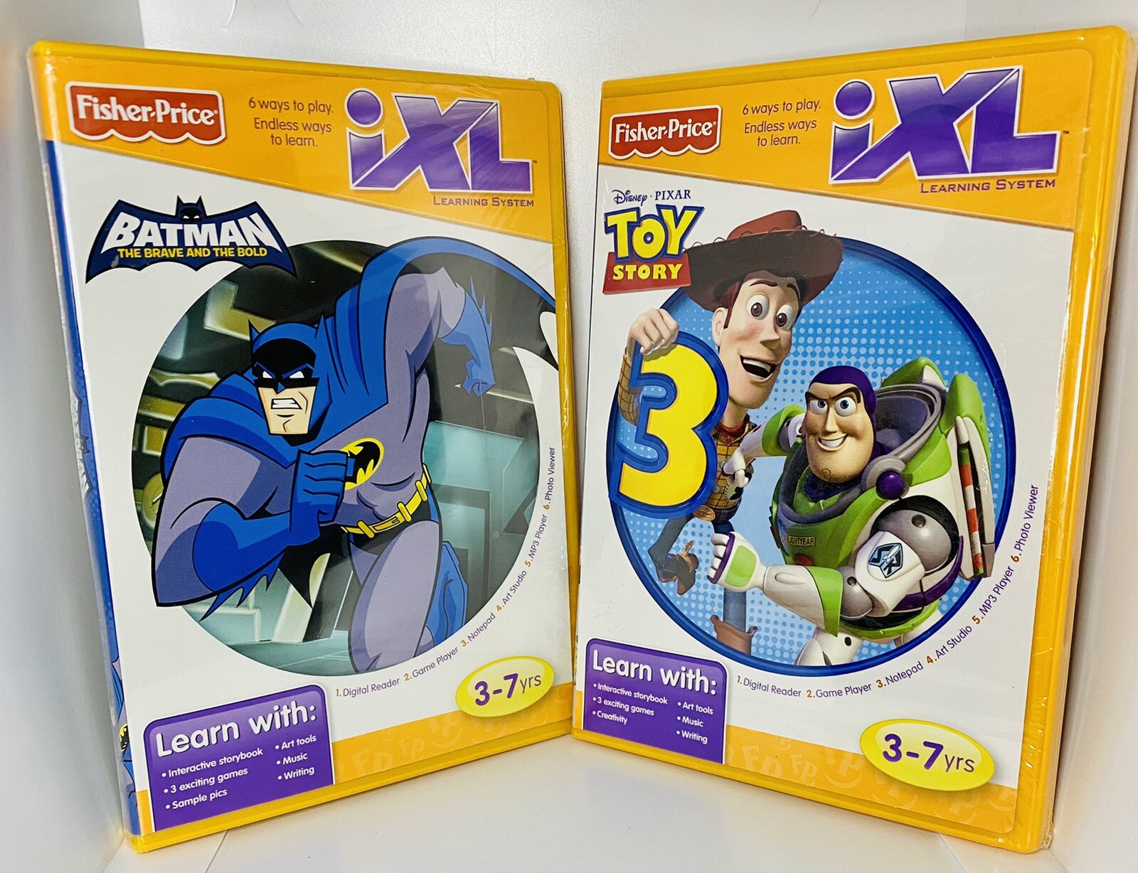 Fisher Price iXL Batman and Toy Story 3. NEW. SEALED!