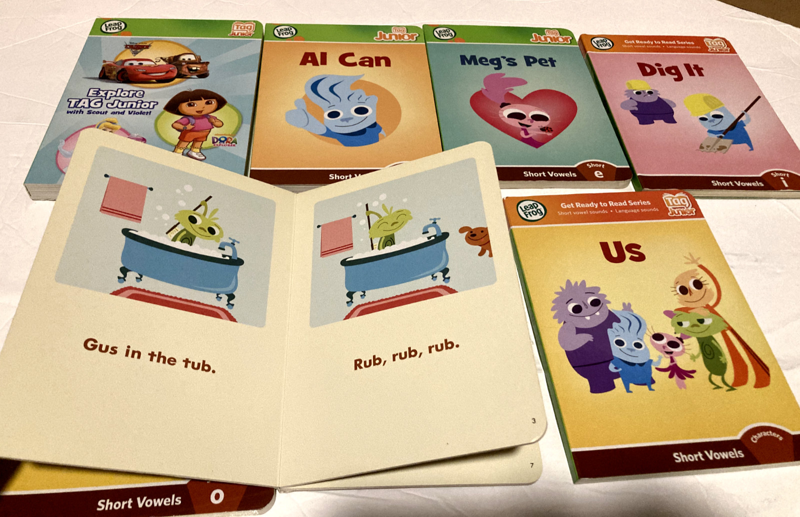 Lot of 7 Leapfrog Tag Junior Short Vowel Sounds and Explore Tag Junior Books