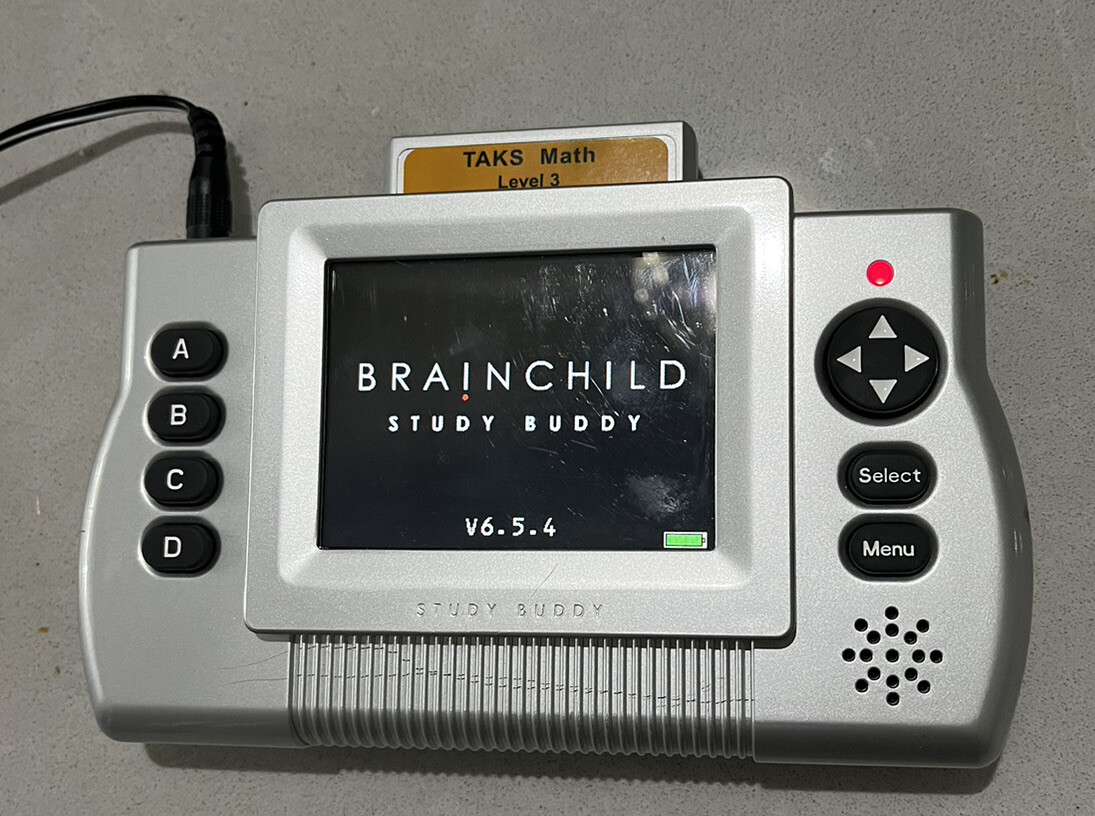 BRAIN CHILD STUDY BUDDY CONSOLES W/TAKS MATH AND CHARGER & BAG