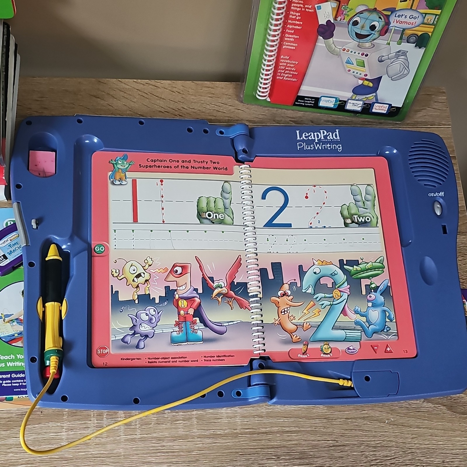 LeapFrog LeapPad Plus Writing Learning System Books Cartridges Stylus Bilingual