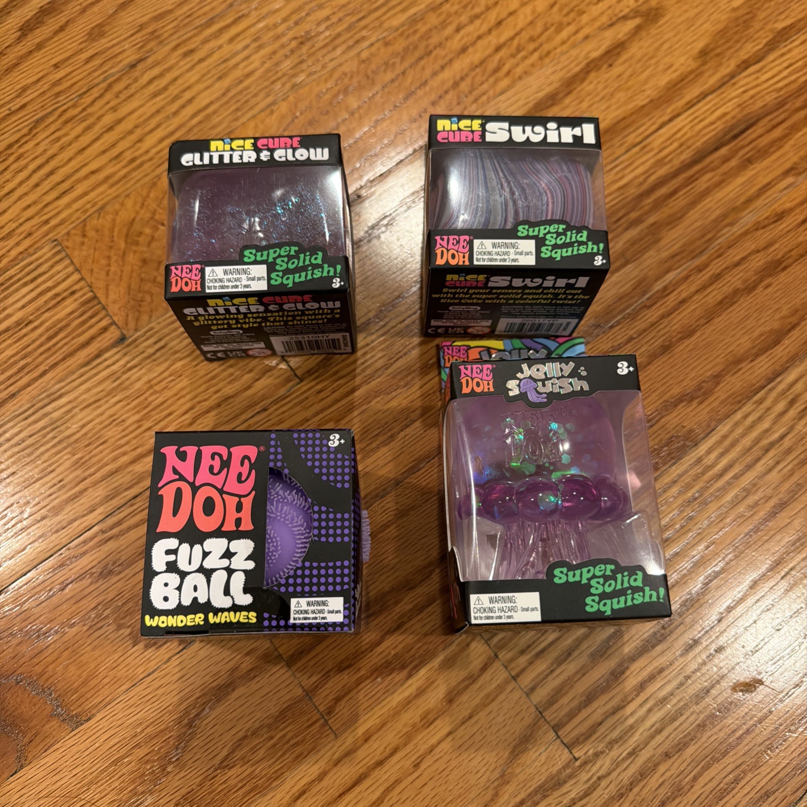 NeeDoh Lot 4 Fuzz Ball Nice Cube Swirl Nice Cube Glitter & Glow Jelly Squish