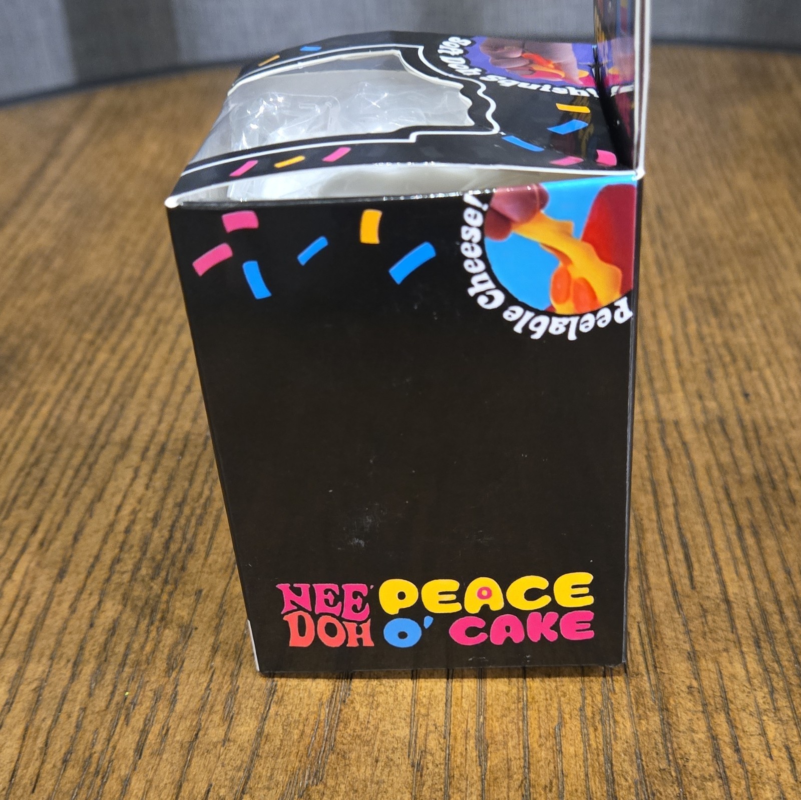 Nee Doh Peace O’ Cake Squeeze Sensory Toy White Blue Yellow Ages 3-11 3+ Years