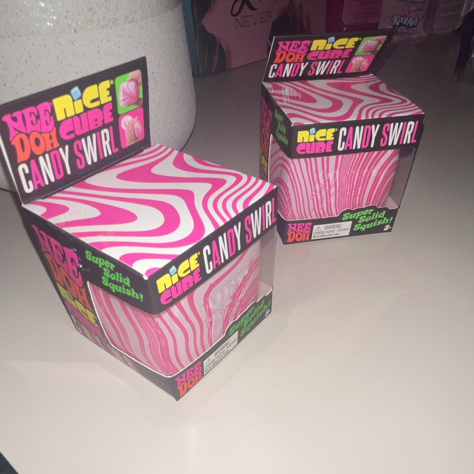 Schylling NeeDoh Nice Cube Candy Swirl Super Solid Squish Pink White