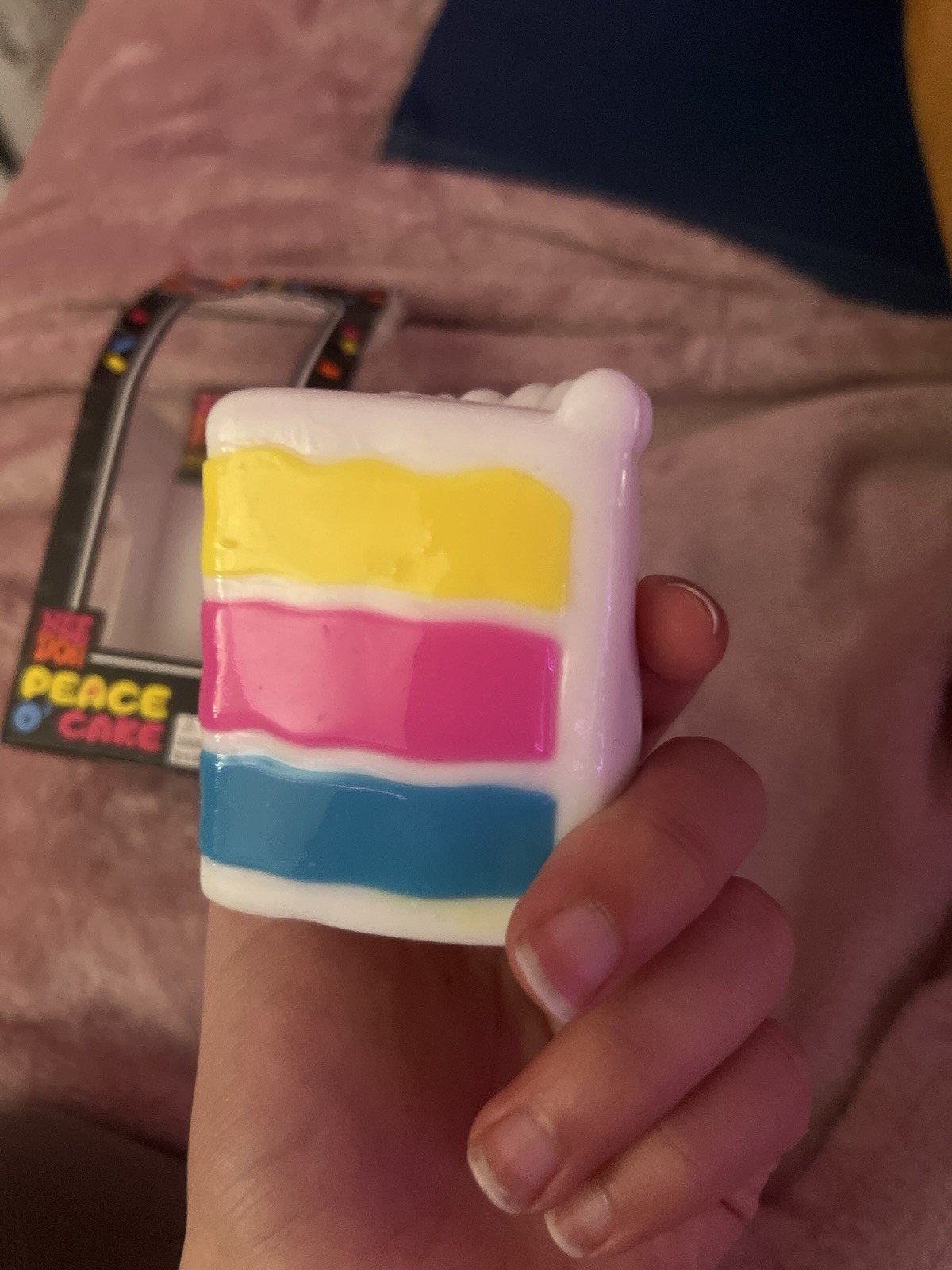 Nee Doh Peace O’ Cake Tactile Squeeze Toy Multicolor White Yellow Pink Blue
