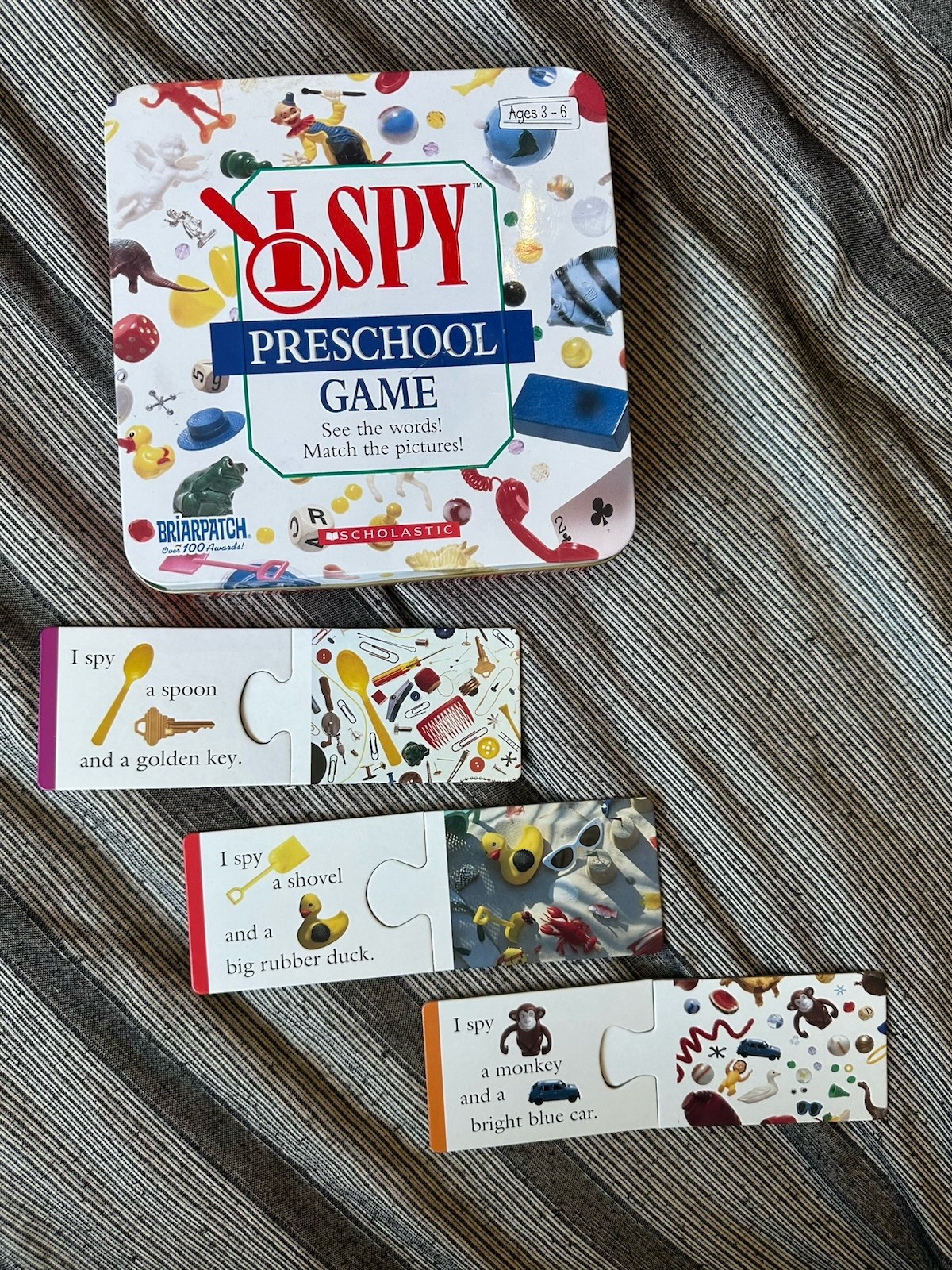 Scholastic I Spy Preschool Game In Tin Box Ages 3 and Up In Very Good Condition