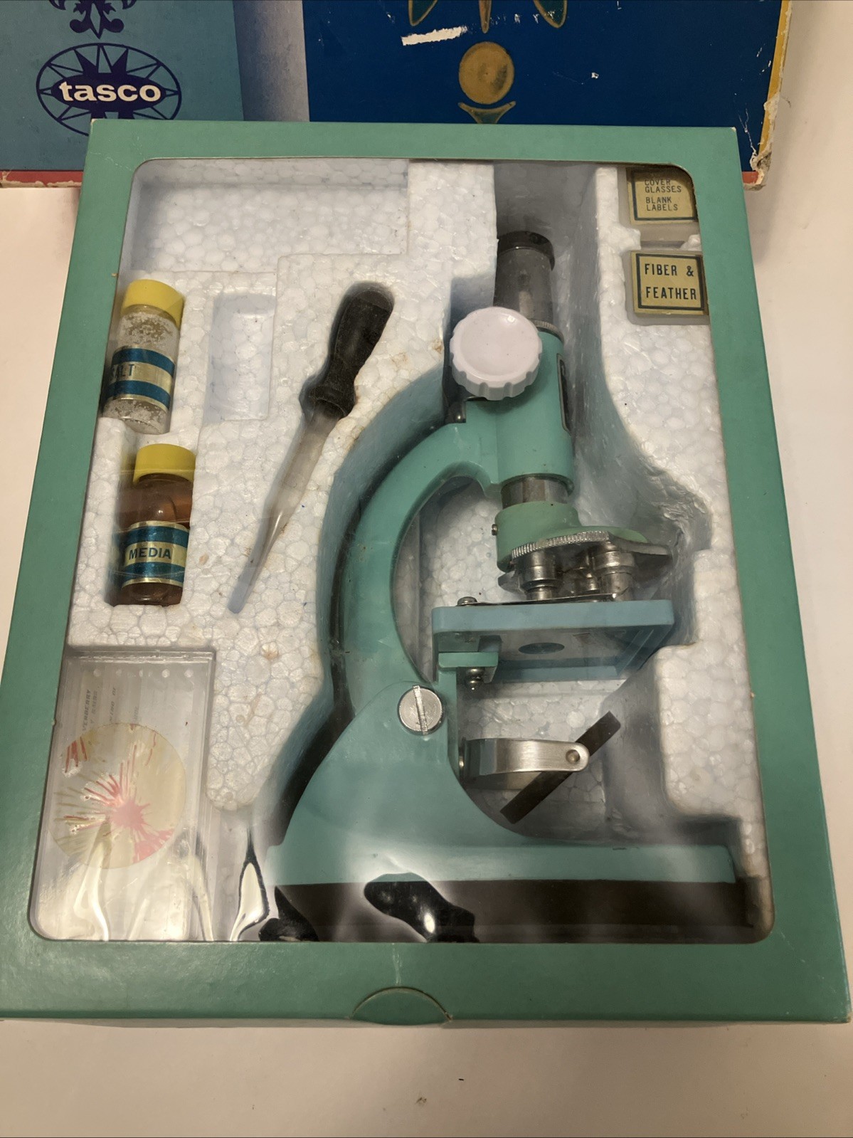 1960’s-70’s ear TASCO #991 Junior 50x, 100x, 300x turquoise microscope in box
