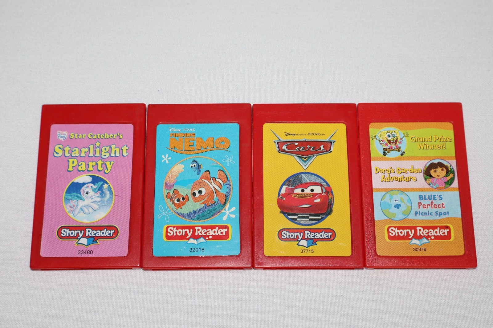 4 Story Reader Read Along System Cartridges Untested