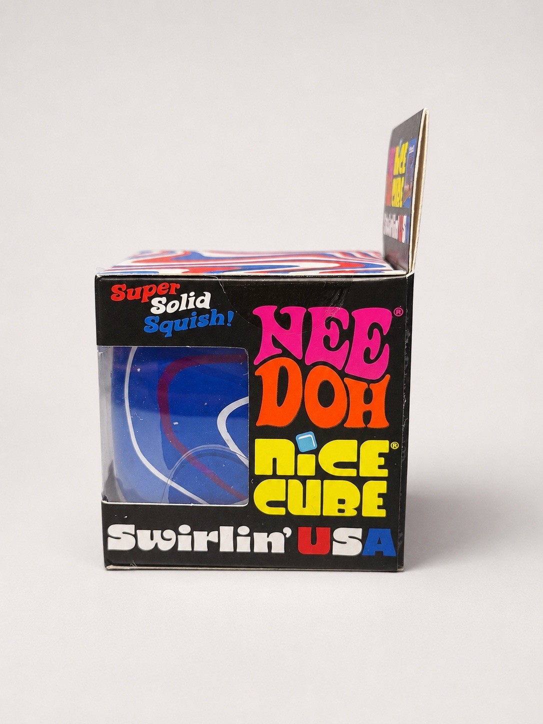 NeeDoh Nice Cube Swirlin’ USA Super Solid Squish Squeeze Toy