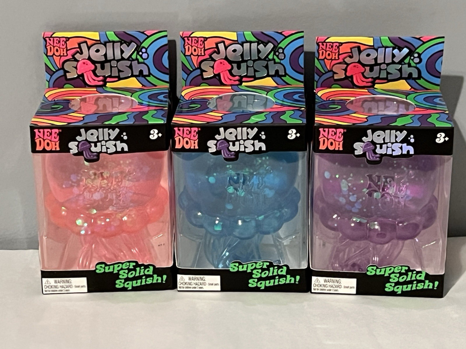 Complete Set of 3 Schylling NeeDoh Jelly Squish: Purple, Pink, Blue ~NEW