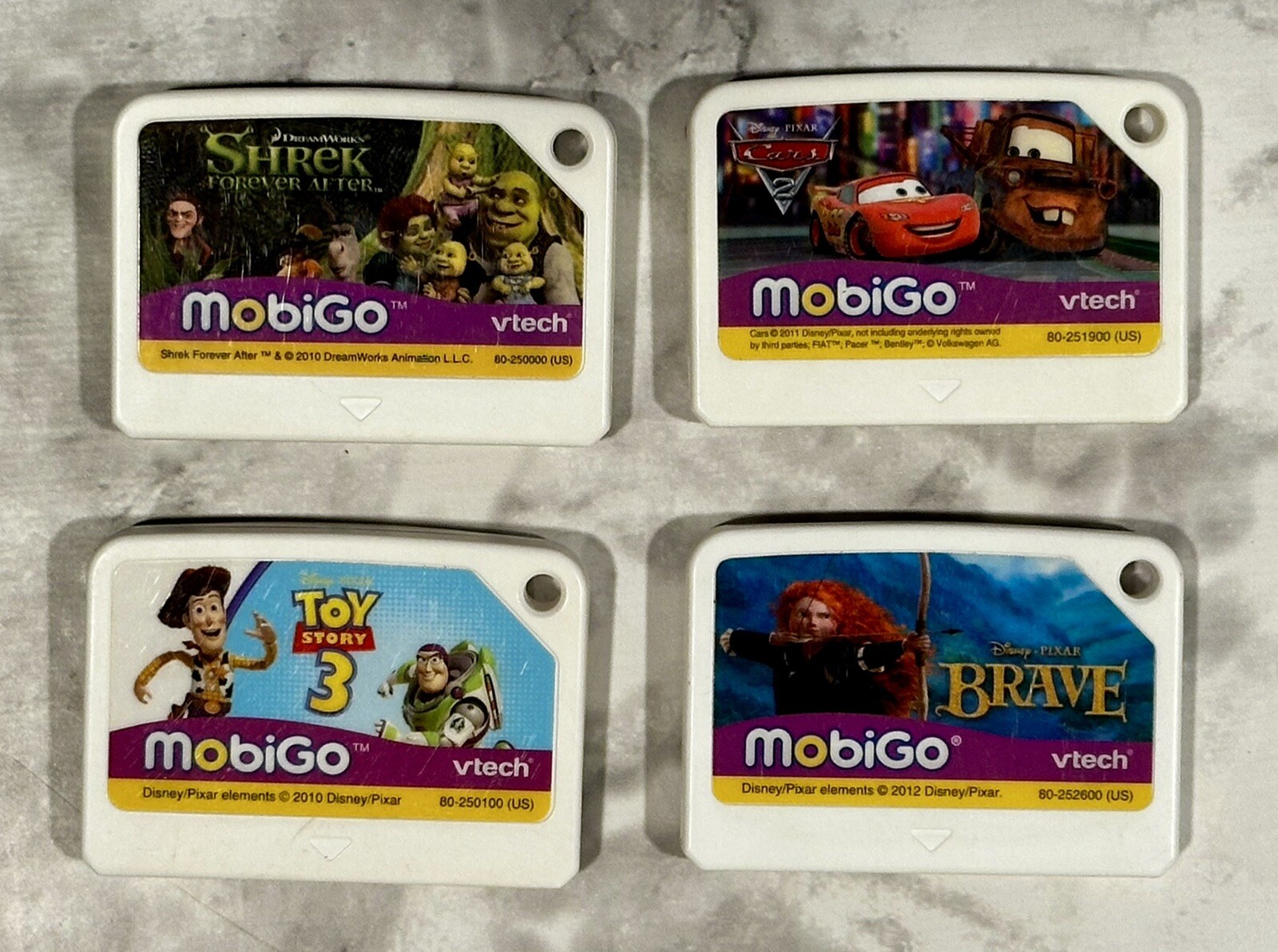 Lot of 4 Vtech MobiGo Loose Learning Games Shrek, Cars, Brave, Toy 3 – TESTED!